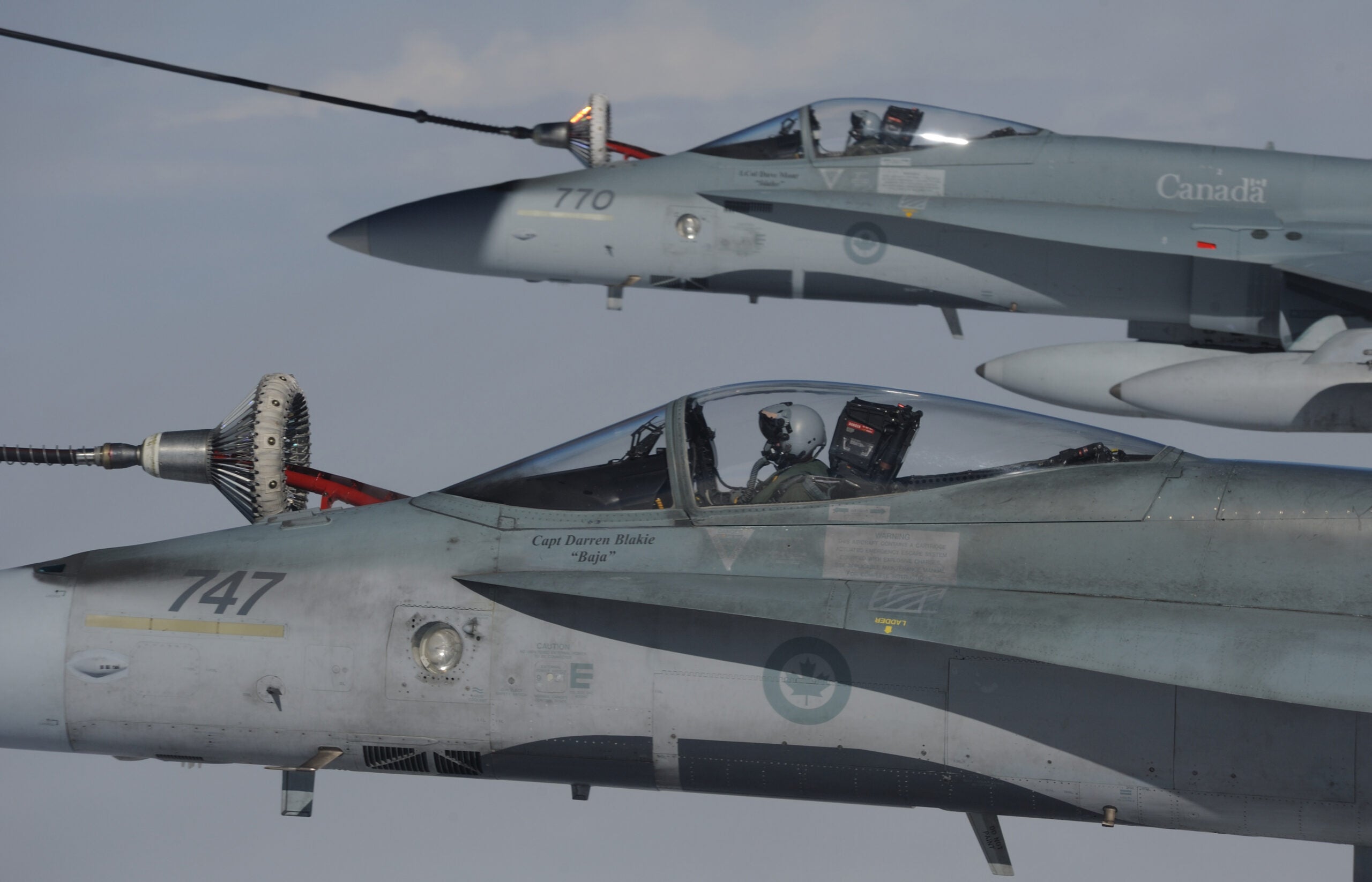 CF-18 Hornet fighter aircraft from 409 Squadron in Cold Lake, Alberta refuel in the air during Exercise Vigilant Eagle 13 on Aug. 28, 2013.
Photo: Cpl. Vicky Lefrancois, DAirPA
FA2013-5100-12