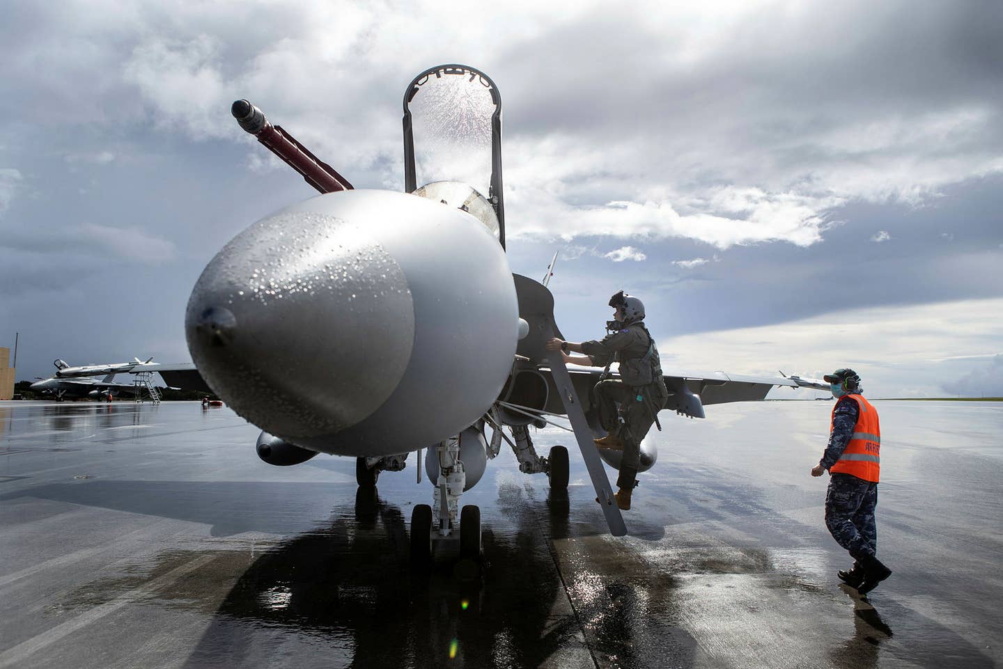 A RAAF pilot boards a F/A-18A during the type's time in service. (RAAF)