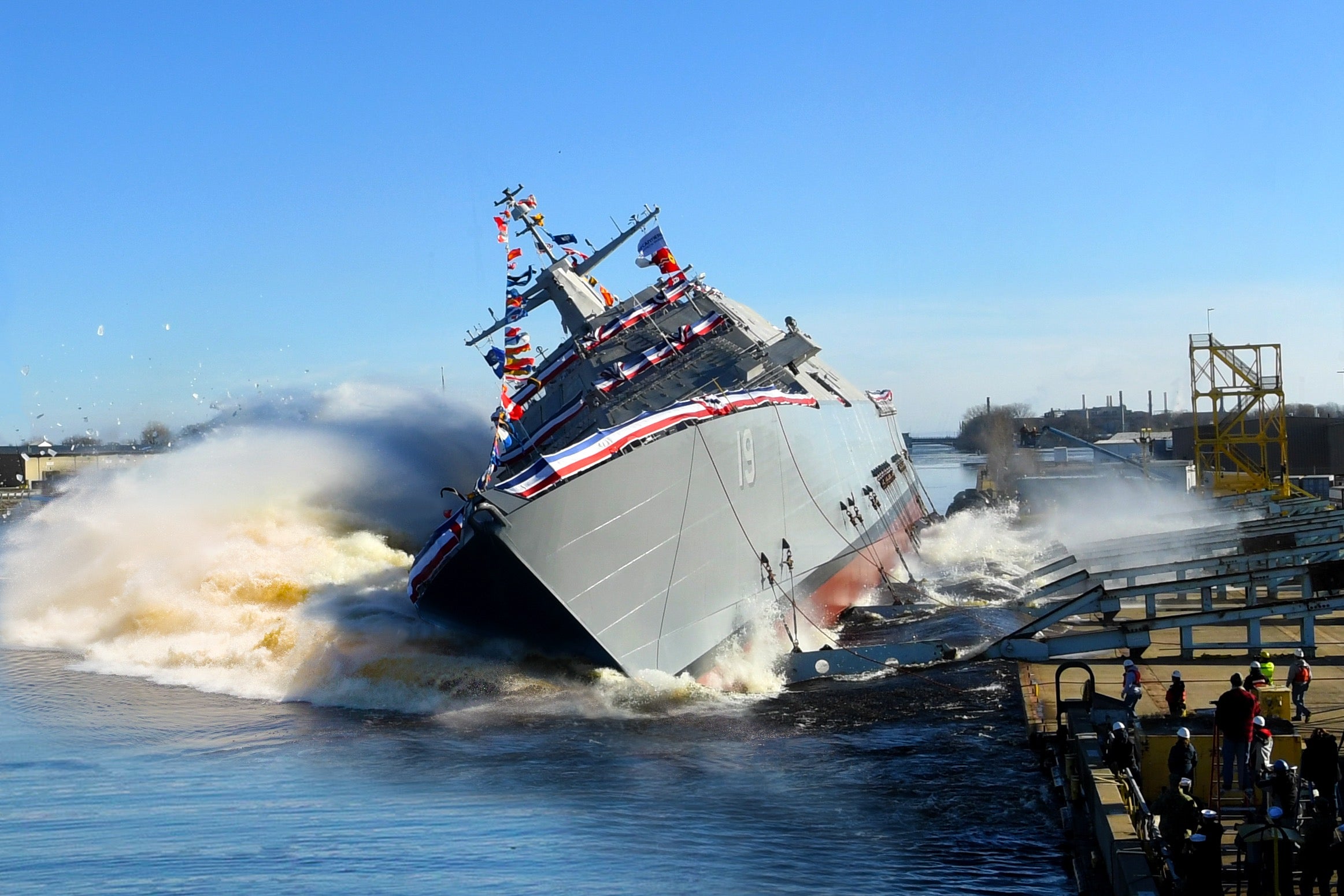 181215-N-N0101-198
MARINETTE, Wisc. (Dec. 15, 2018) The  future littoral combat ship USS St. Louis (LCS 19) launches sideways into the Menominee River in Marinette, Wisconsin, following its christening, Dec. 15, 2018, by ship's sponsor Barbara Taylor. Once commissioned, LCS-19 will be the seventh ship to bear the name St. Louis. (U.S. Navy photo/Released)