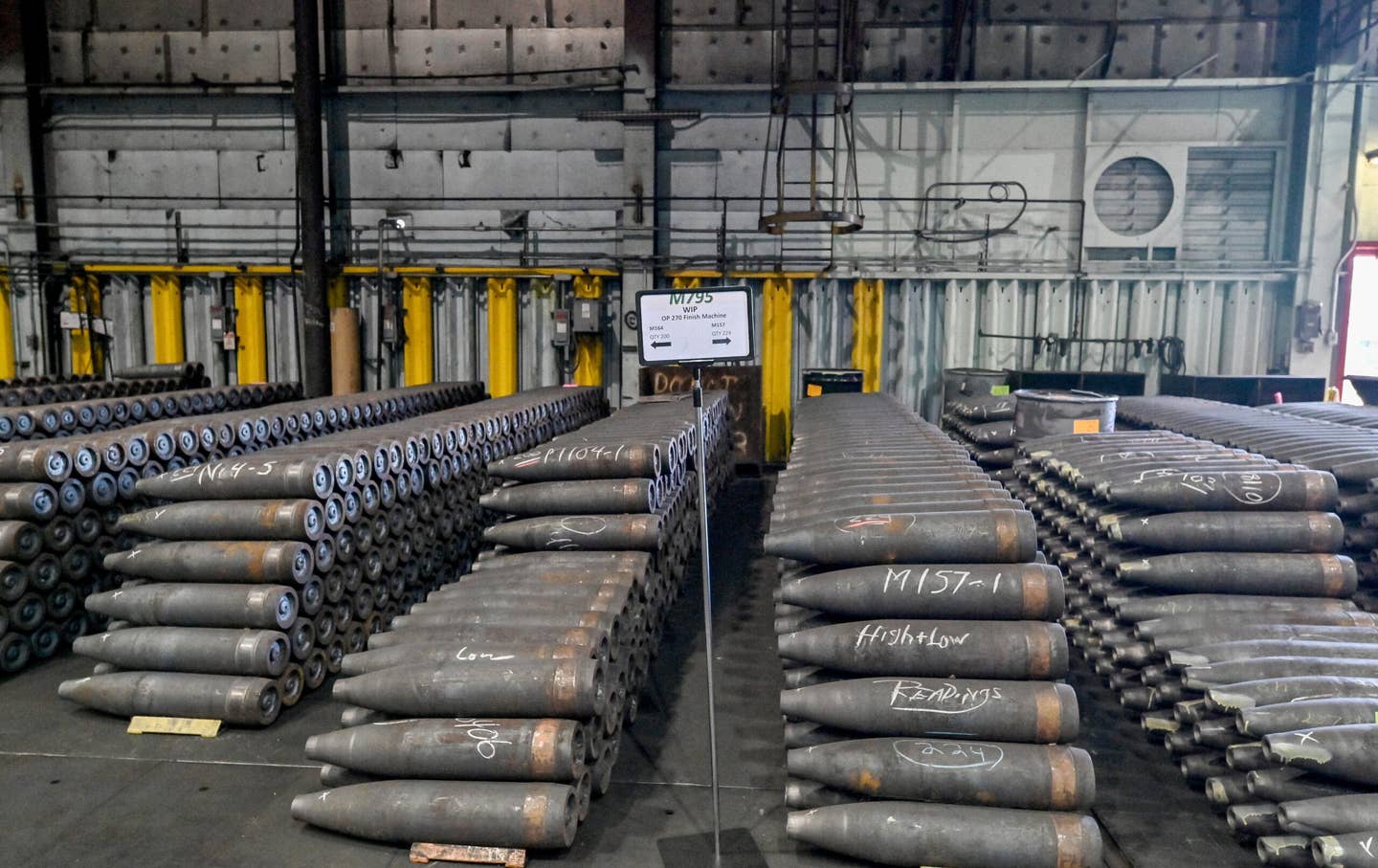 Rows of incomplete shells wait for the next step in production. The plant makes a 155mm artillery shell. (Photo by Aimee Dilger/SOPA Images/LightRocket via Getty Images)