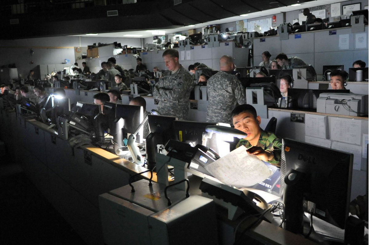 American and Korean servicemembers conduct operations at the Korea Air Operations Center at Osan Air Base, South Korea, during an exercise earlier this year. More than 30,000 American and 500,000 South Korean servicemembers currently are participating in Exercise Ulchi Freedom Guardian which runs from Aug. 16 to 26, 2010. This year marks the 34th anniversary of the joint/combined exercise. (U.S. Air Force photo illustration)