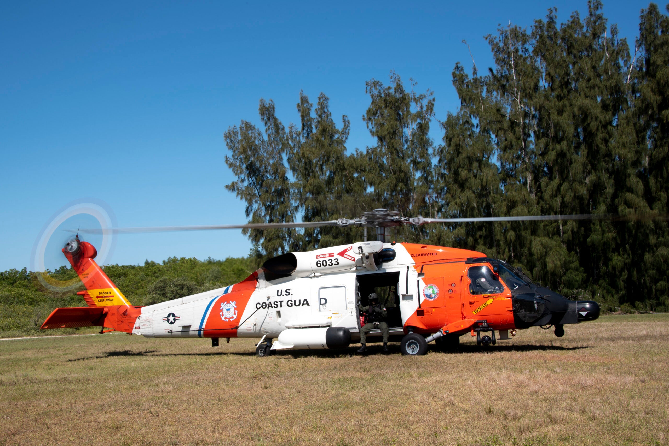 An MH-60T crew from Coast Guard Air Station Clearwater conducts training exercises, MacDill Air Force Base, Florida, May 14, 2021. The crews practiced a variety of drills, part of their  rigorous training to keep their qualifications current and ensure they are prepared for a variety of scenarios they could encounter. (Coast Guard photo by Petty Officer 1st Class Lisa Ferdinando)