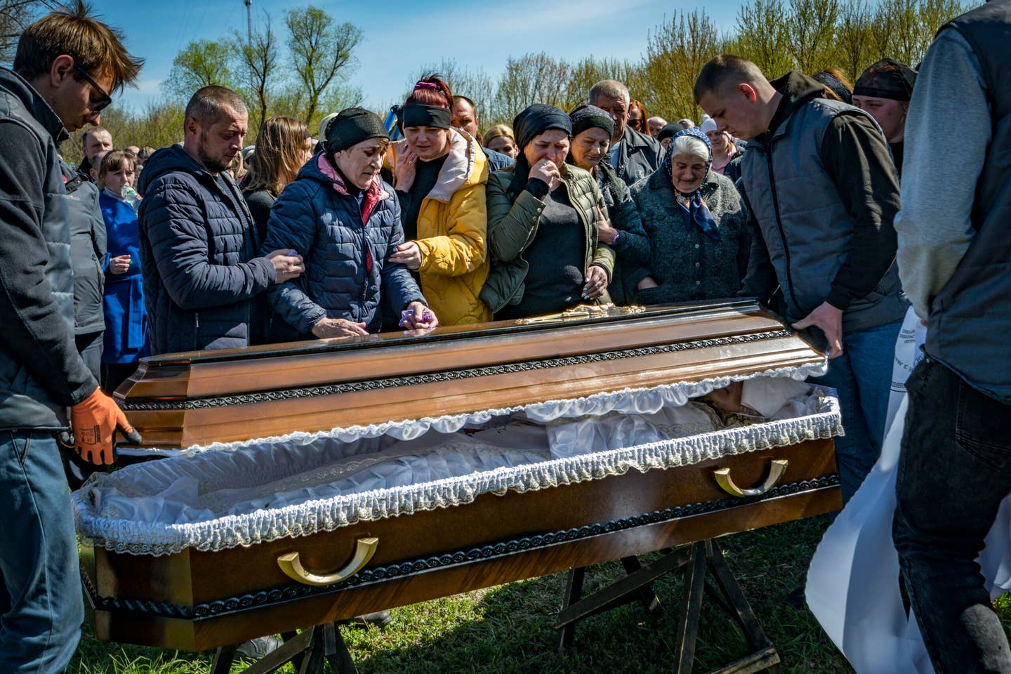 Family of Valentin Borisovych Matveyenko, a soldier killed in the Bakhmut on April 11, attends his burial in Velykyi Sambir cemetery, where he lived. (Photo by Celestino Arce/NurPhoto via Getty Images)