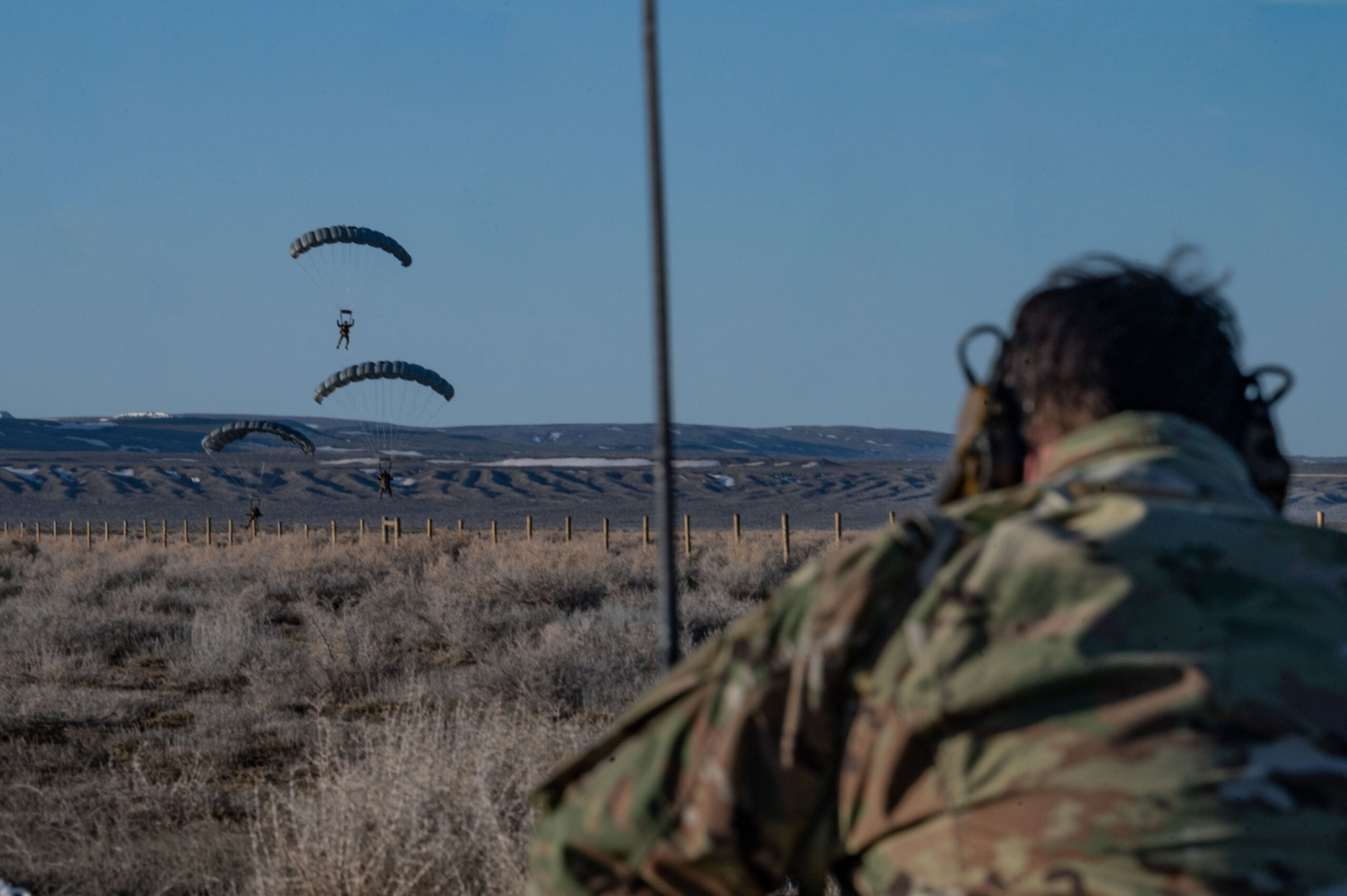 123rd Special Tactics Squadron operators land after performing a static line jump from an MC-130J Commando II during Exercise Agile Chariot, April 30, 2023, honing capabilities linked to Agile Combat Employment. Instead of relying on large, fixed bases and infrastructure, ACE uses smaller, more dispersed locations and teams to rapidly move and support aircraft, pilots, and other personnel to wherever they are needed. There are millions of miles of public roads in the United States, including federal, state, and local roads – with Agile Combat Employment, including Forward Arming and Refueling Point (FARP) and Integrated Combat Turnarounds (ICT), it can become millions of miles of public runways, when necessary. (U.S. Air Force photo by Tech. Sgt. Carly Kavish)