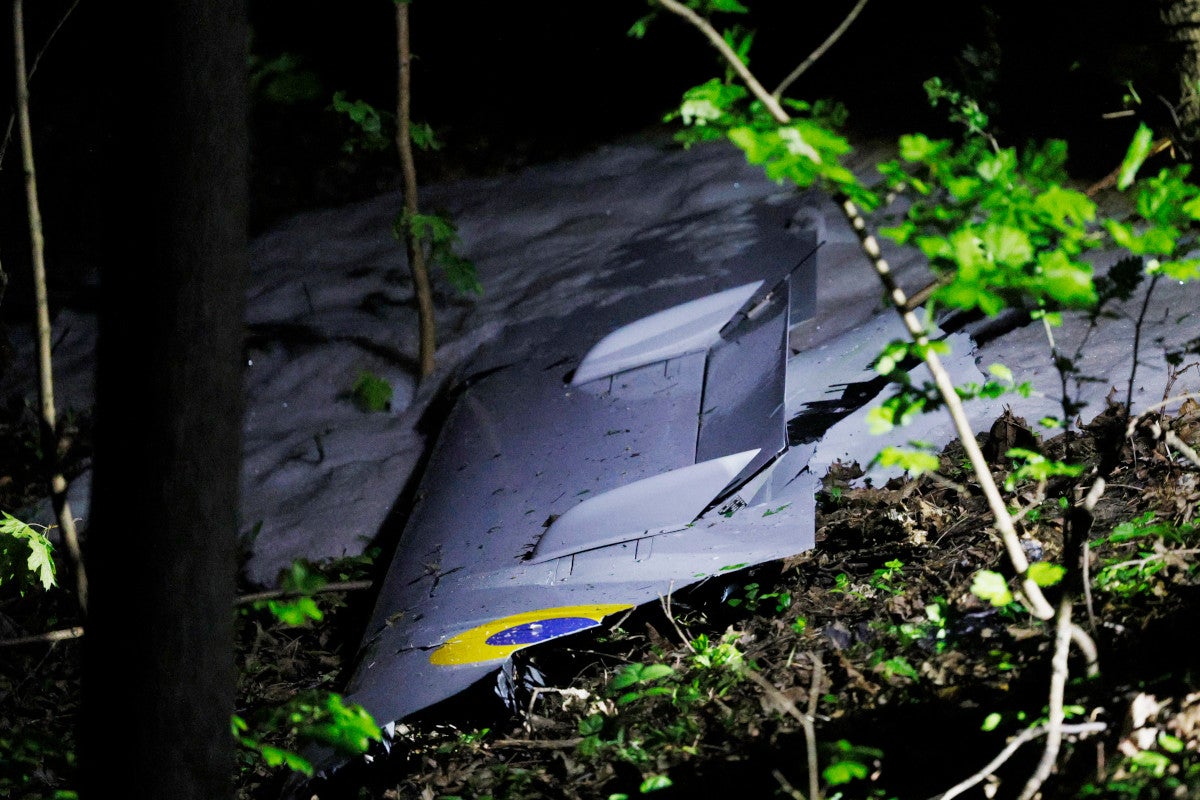 A part of a Russian military drone on the ground after been downed in downtown Kyiv, Ukraine, Thursday, May 4, 2023. (AP Photo/Alex Babenko)