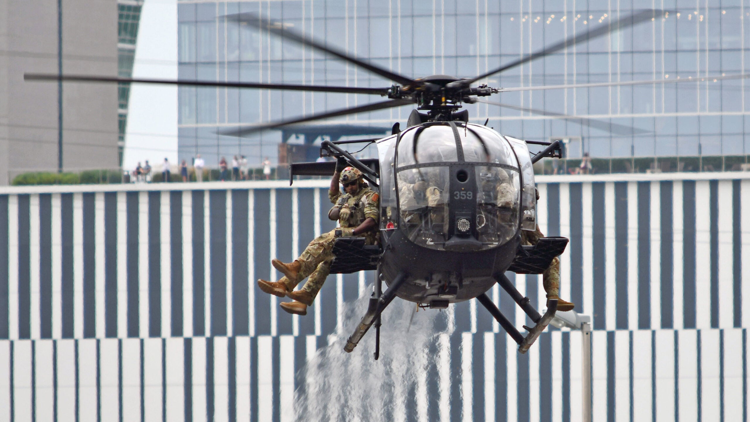 Members of the 5th Special Forces Group (Airborne) and the 160th SOAR deliver the Big Machine Grand Prix trophy in Nashville, Tennessee on August 6th, 2021. Team members also set up a static display showing off some of the tools of their trade and answered questions from curious race goers.