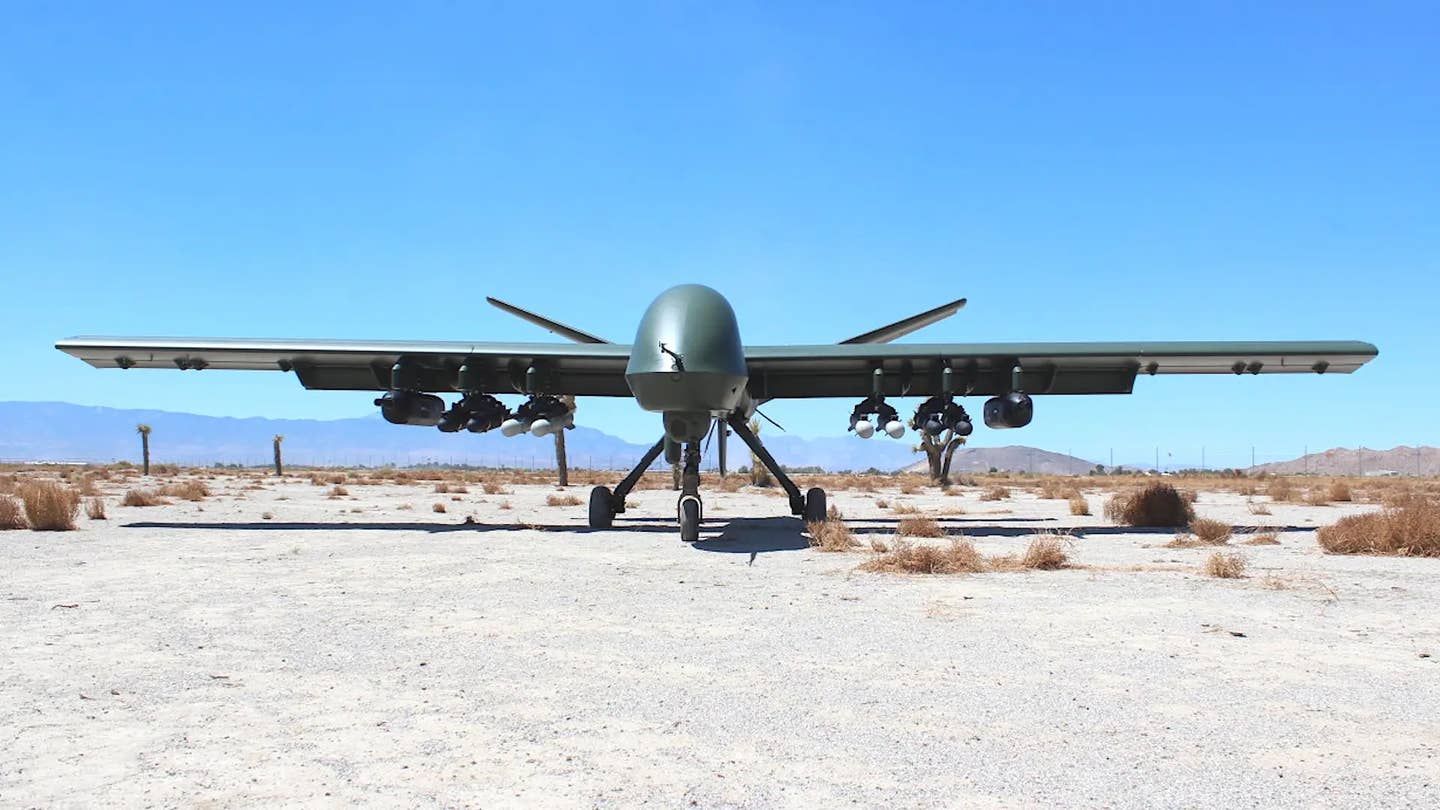 The Mojave drone with the Dillon Aero gun pods, as well as various missiles, under its wings.&nbsp;<em>GA-ASI</em>