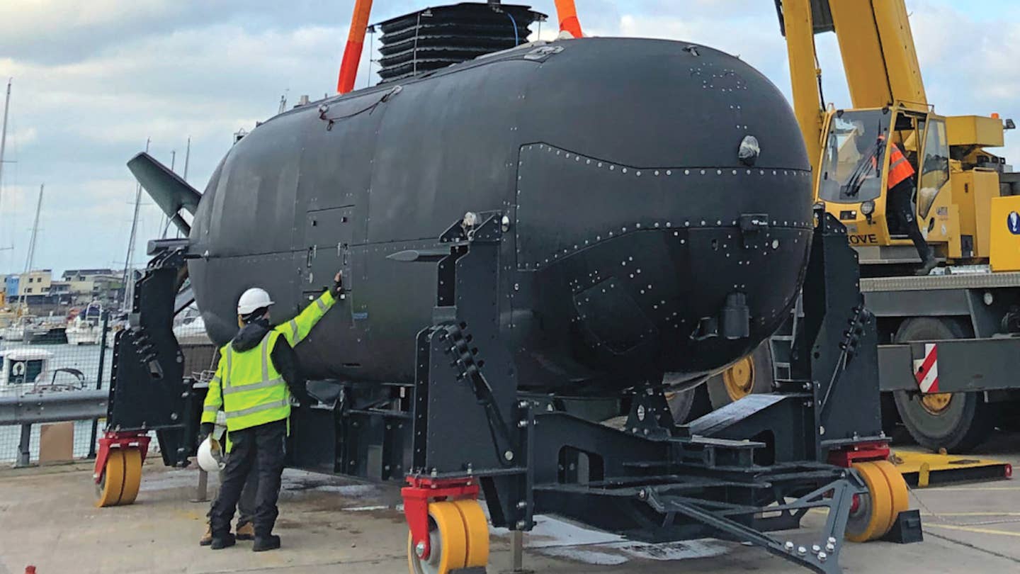 A picture of one of the Navy's Dry Combat Submersibles (DCS) out of the water. <em>DOD</em>