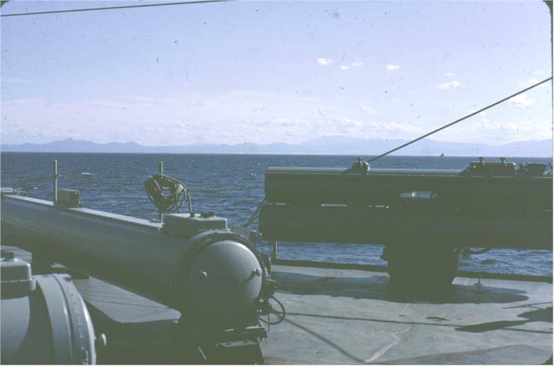 A 21-inch HWT tube mount on USS <em>Allen M. Sumner</em> (DD-692). During the FRAM II overhaul two Mk 25 tubes were installed on the O-1 Deck with one on each side angled forward at approximately a 45-degree angle. The tubes could be adapted to fire the Mk 37 Mod 0 torpedo. <em>DD-692.com with permission</em>