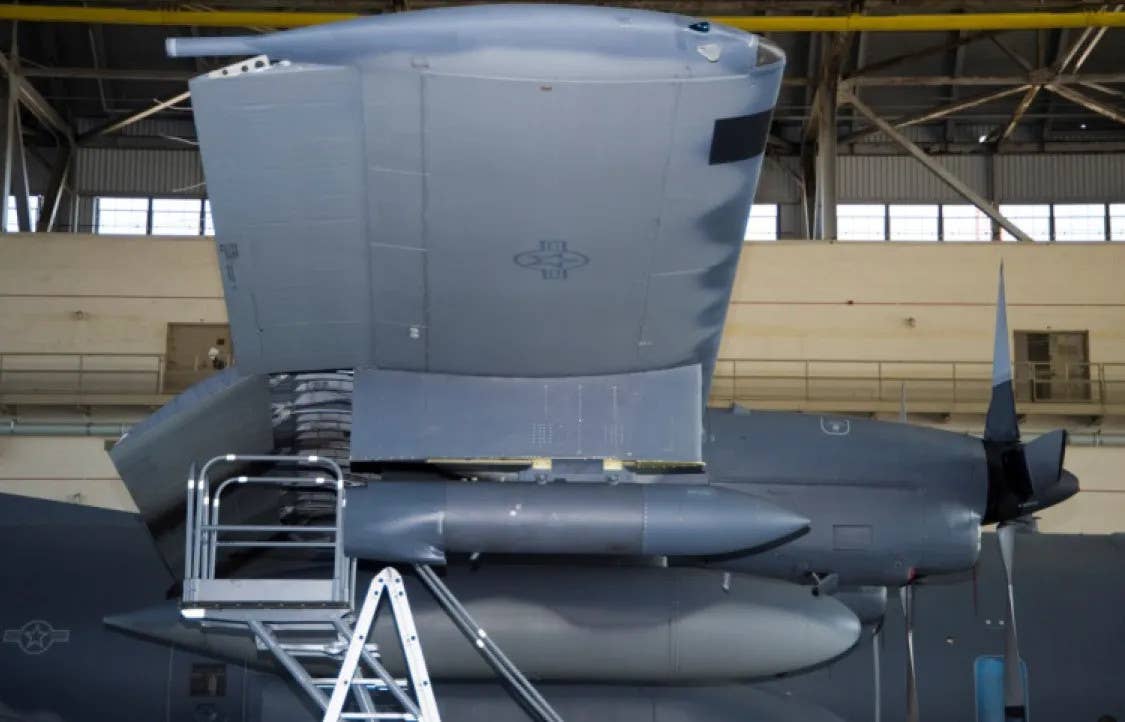 An AN/ASQ-236&nbsp;Dragon's Eye radar pod under the wing of an AC-130 gunship. <em>USAF</em>