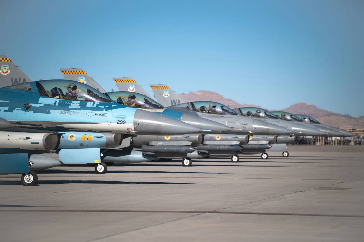 F-16C Vipers assigned to the 64th Aggressor Squadron at Nellis Air Force Base in Nevada. <em>USAF</em>