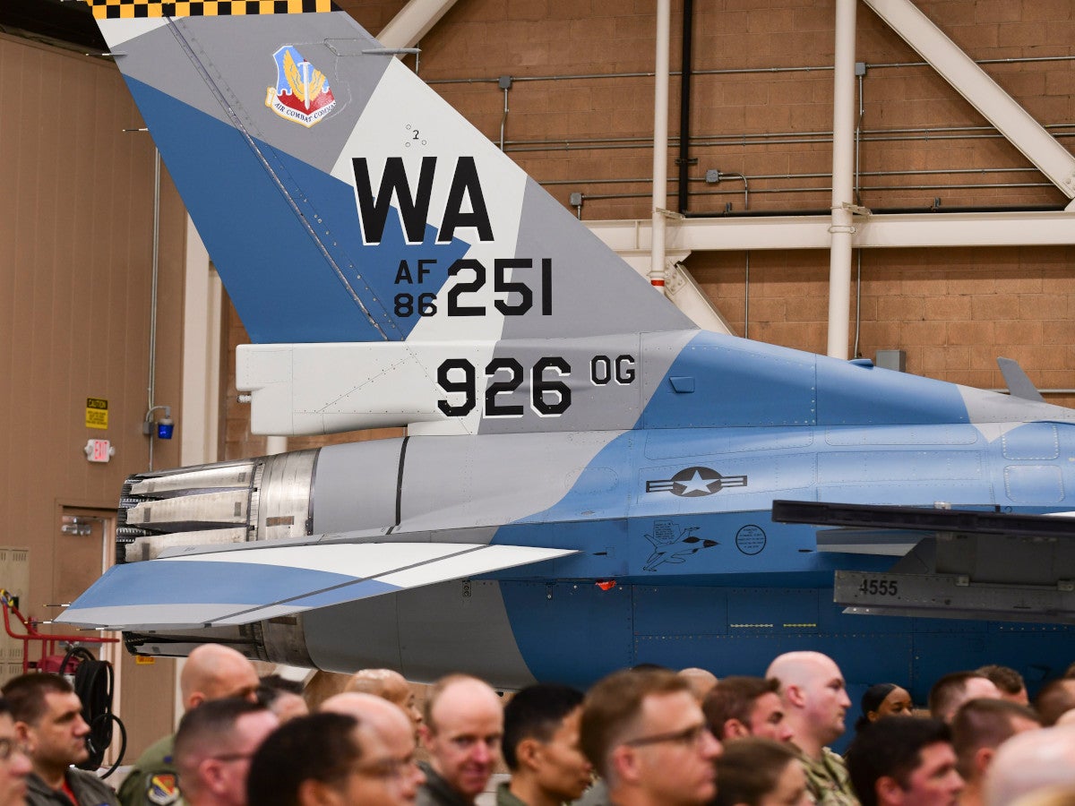 The 926th Wing redesignates the 706th Fighter Squadron to become the 706th Aggressor Squadron during a ceremony May 5, 2023, Nellis Air Force Base, Nevada.(U.S. Air Force photo by Tech. Sgt. Lucretia Cunningham)
