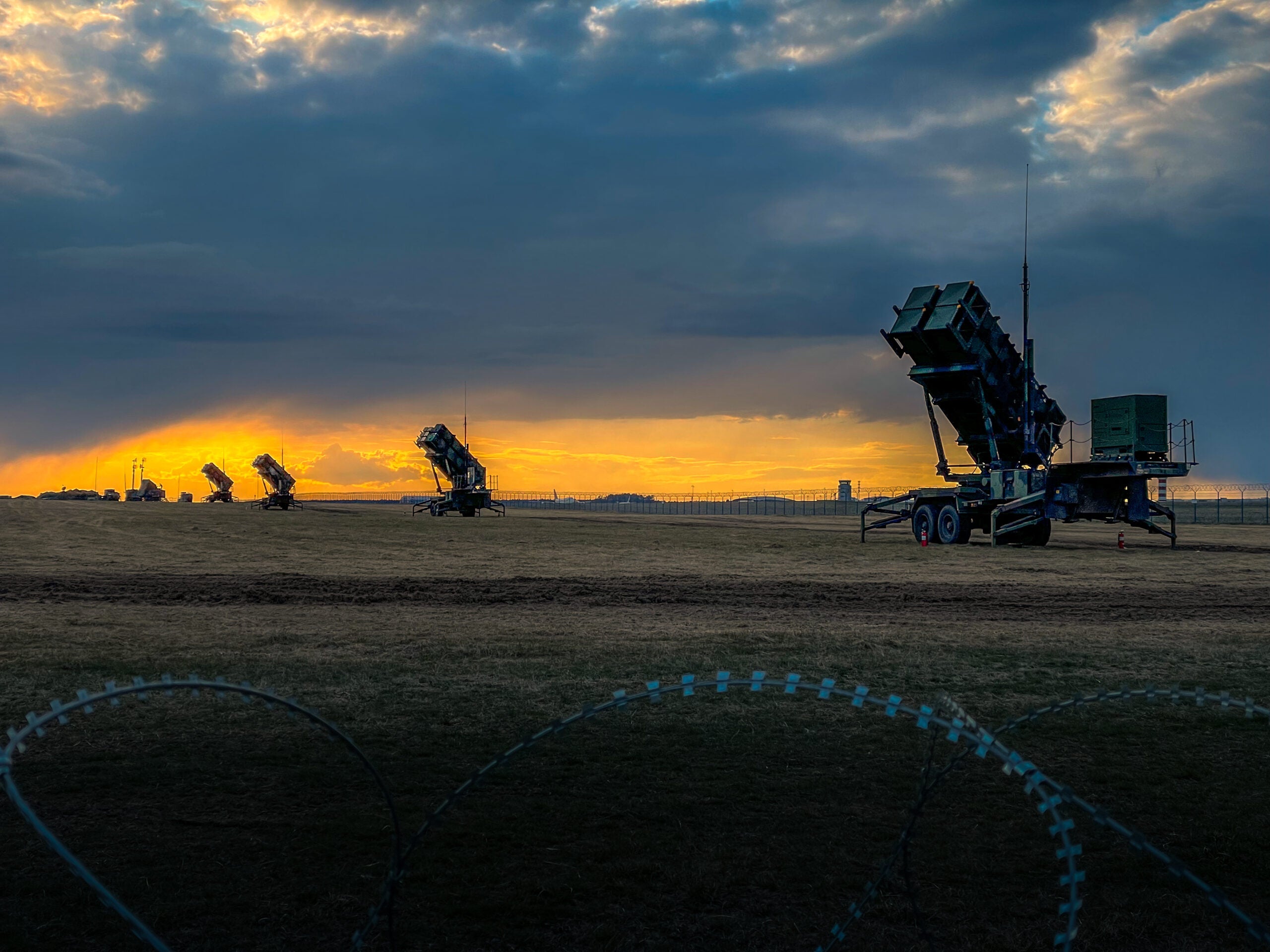 U.S. Patriot missile batteries from the 5th Battalion, 7th Air Defense Artillery Regiment stand ready at sunset in Poland on April 10, 2022. The deployment of these air &amp; missile defense systems is purely defensive. They contribute to the robust shielding provided along NATO’s Eastern flank. The SBAMD systems will protect Allied, populations, territory, and our deployed forces from attack. 

(U.S. Army photo by Sgt. 1st Class Christopher Smith)