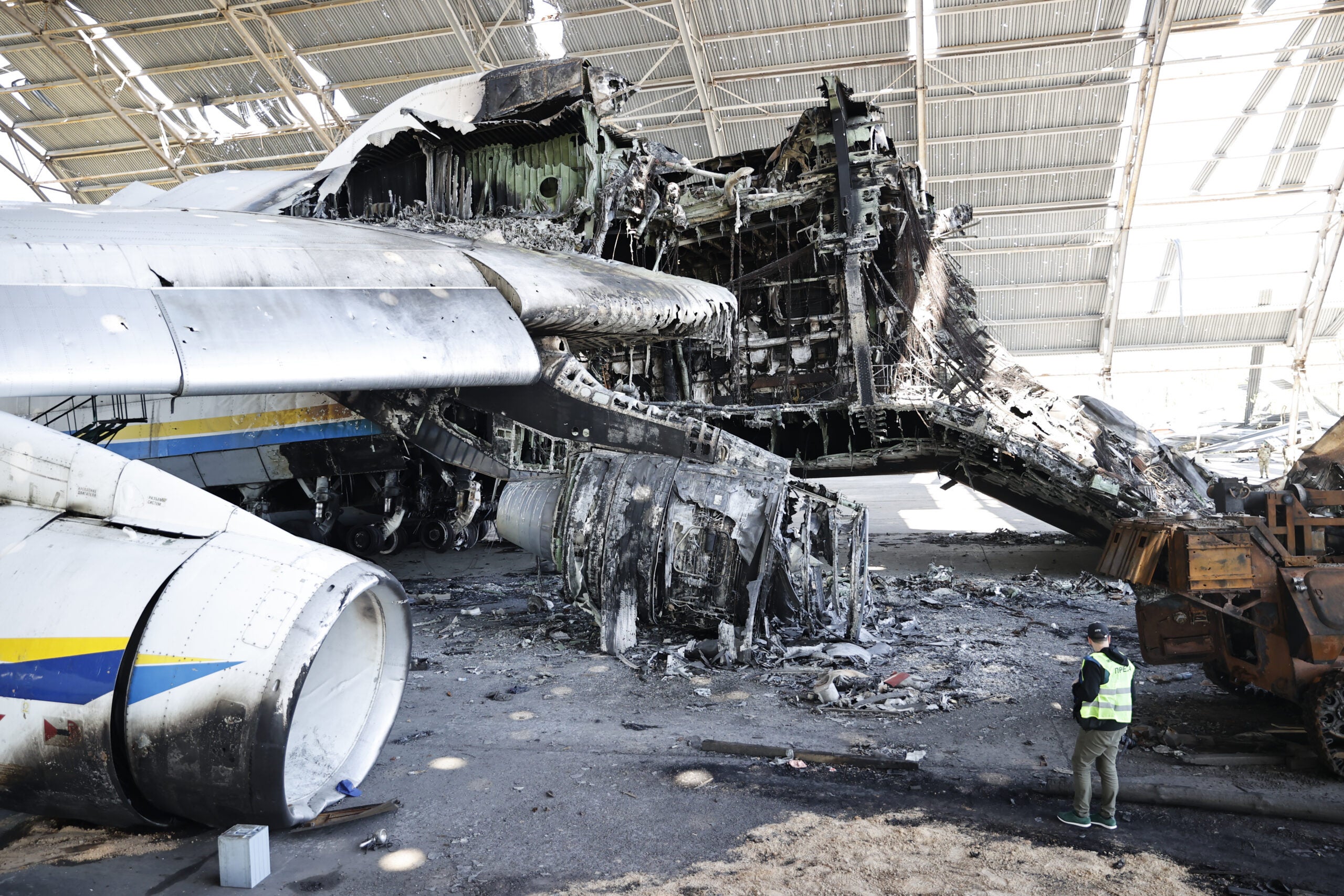 HOSTOMEL, UKRAINE - MAY 5: A view of the wreckage of the Antonov An-225 Mriya, the world's largest cargo plane, at an airshed after it was destroyed by Russia's attacks on Ukraine as cleaning works continue at Antonov Airport in Hostomel, Ukraine on May 5, 2022. (Photo by Dogukan Keskinkilic/Anadolu Agency via Getty Images)
