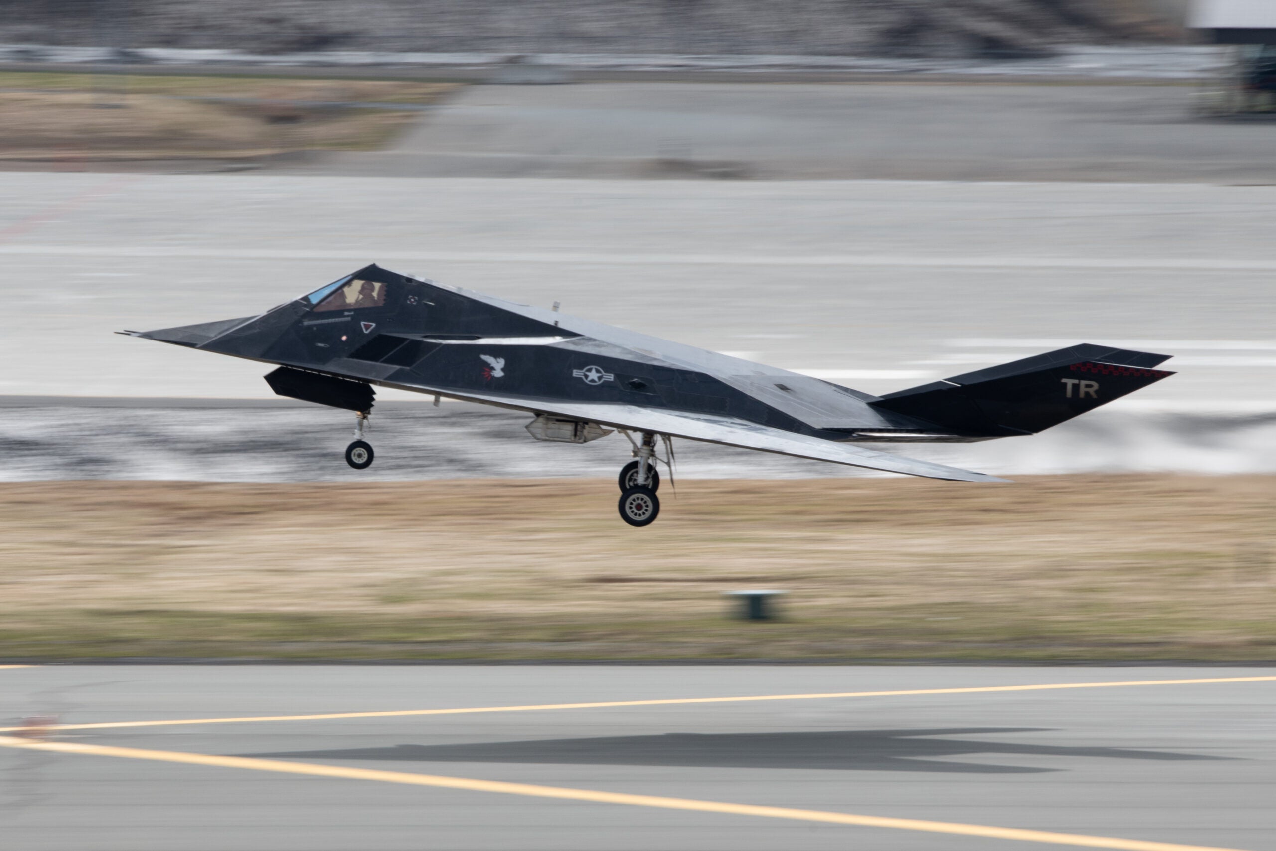 A U.S. Air Force F-117 Nighthawk prepares to land during Northern Edge 23-1 at Joint Base Elmendorf-Richardson, Alaska, May 10, 2023. Northern Edge 23-1 provides an opportunity for joint, multinational and multi-domain operations designed to implement high-end, realistic war fighter training, develop and improve joint interoperability, and enhance the combat readiness of participating forces. (U.S. Air Force photo by Senior Airman Patrick Sullivan)