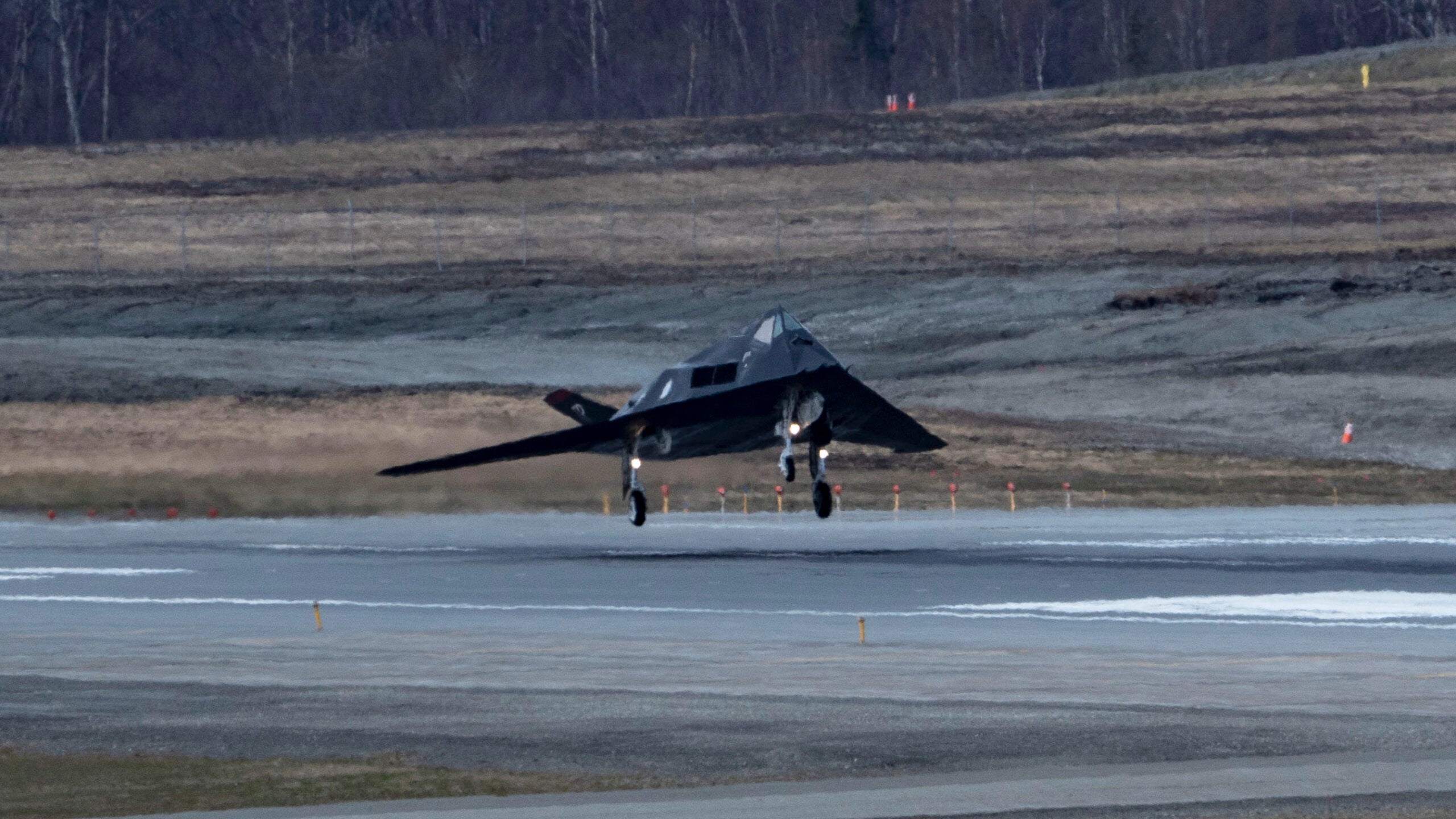 A U.S. Air Force F-117 Nighthawk lands during Northern Edge 23-1 at Joint Base Elmendorf-Richardson, Alaska, May 10, 2023. Northern Edge 23-1 provides an opportunity for joint, multinational and multi-domain operations designed to implement high-end, realistic war fighter training, develop and improve joint interoperability, and enhance the combat readiness of participating forces. (U.S. Air Force photo by Airman 1st Class Julia Lebens)