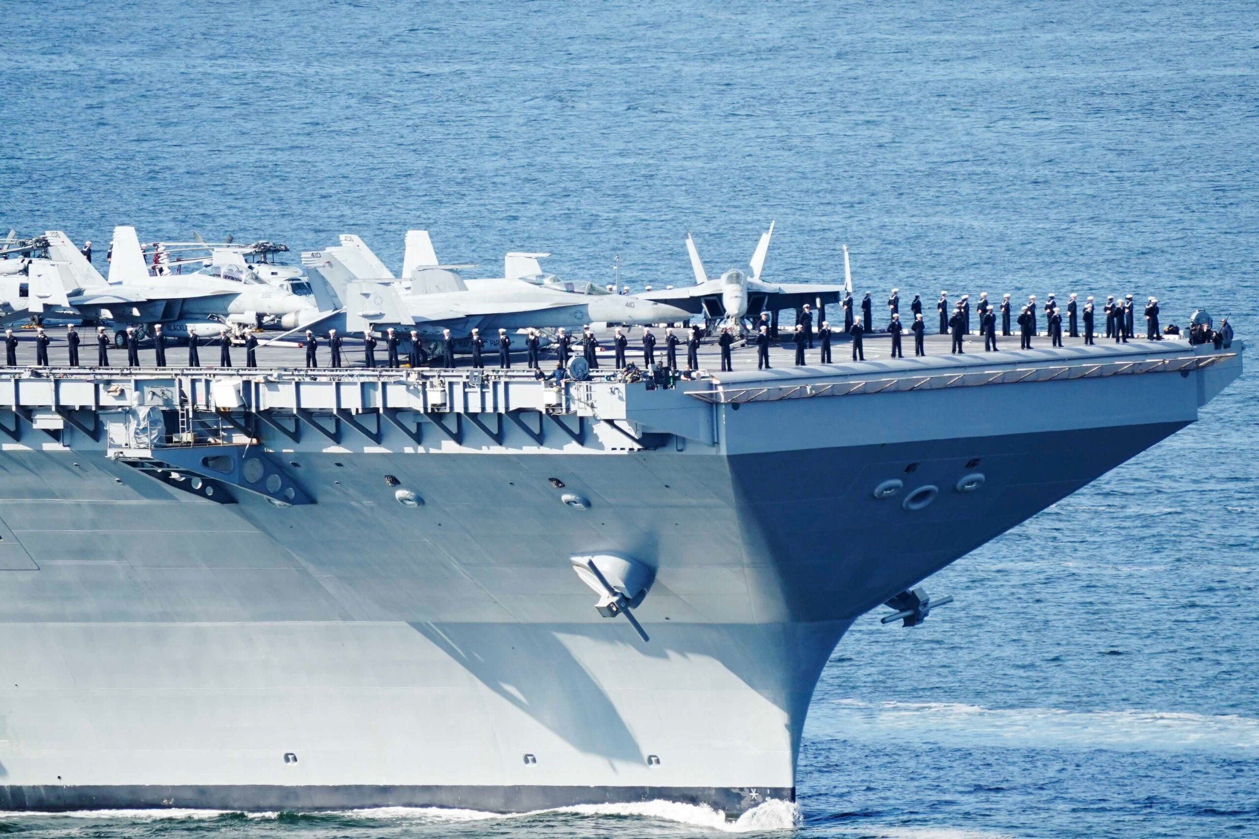 This photograph taken on May 24, 2023 shows the US aircraft carrier USS Gerald R. Ford cruising near Jeloya island, in Moss, south of Oslo. The ship is the world's largest warship and will be in port in Oslo for four days. Russia's embassy in Norway on Tuesday, May 23, 2023 hashly criticised the visit by the US aircraft carrier to Oslo as an "illogical and harmful" show of force. (Photo by Terje Pedersen / NTB / AFP) / Norway OUT (Photo by TERJE PEDERSEN/NTB/AFP via Getty Images)