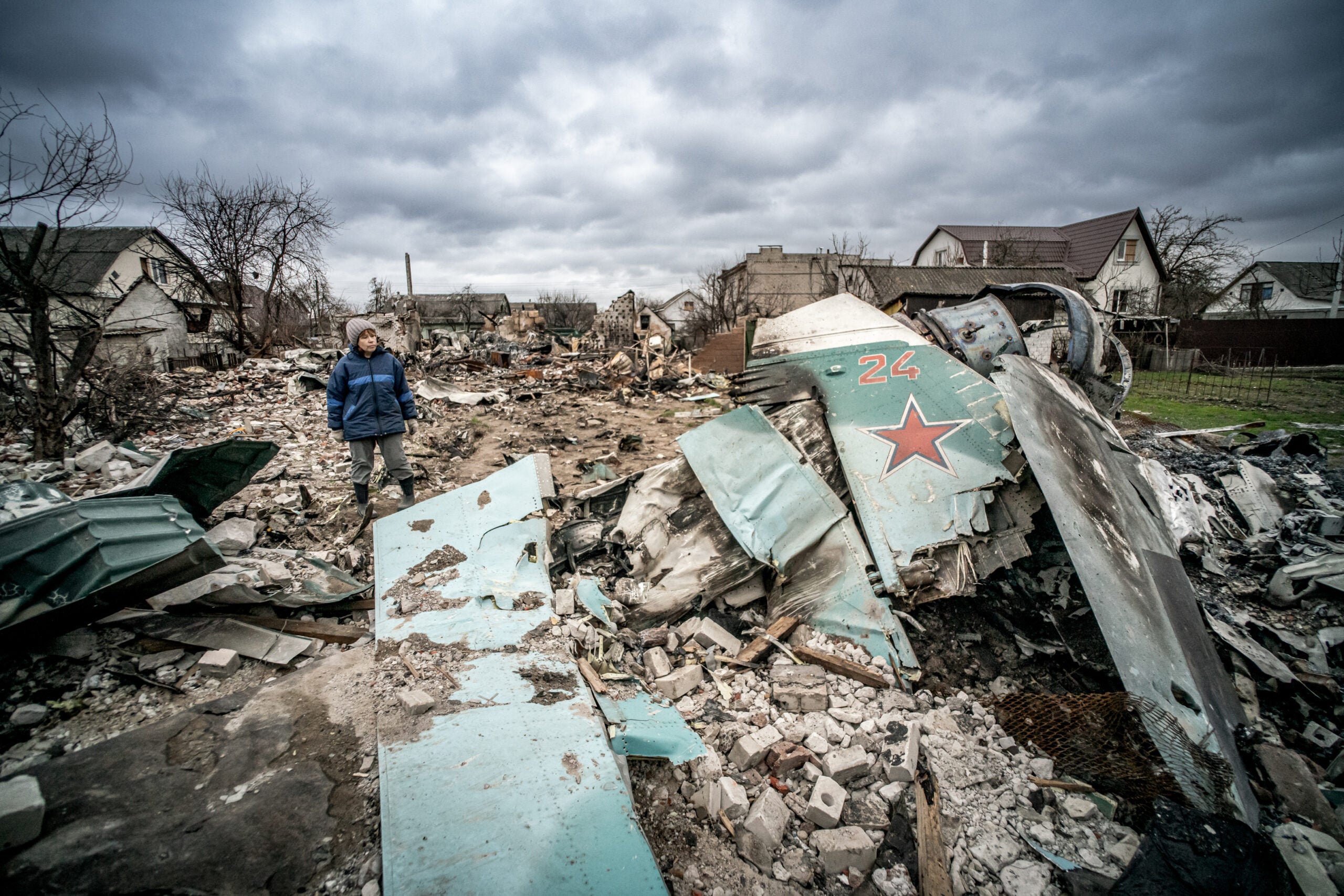 Chernihiv, Kiev Oblast, A Russian Sukhoi Su-34 shot down by Ukrainian anti-aircraft guns crashed in a residential area of __Chernihiv. The pilot, who managed to eject himself, was captured, his navigator killed. (Photo by: Nicola Marfisi/AGF/Universal Images Group via Getty Images)