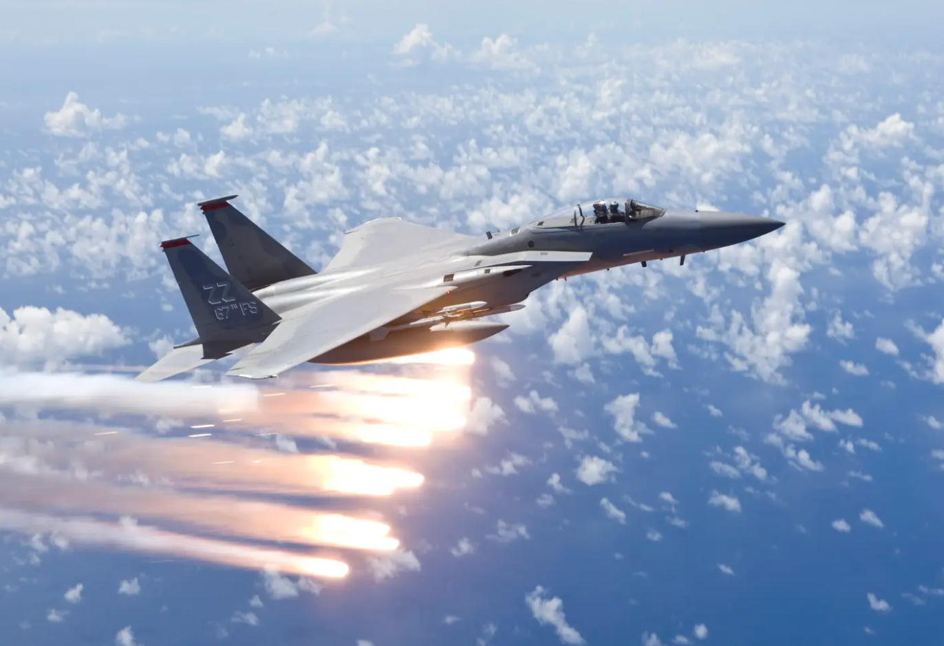 An F-15C from the 67th Fighter Squadron, previously based at Kadena Air Base, Okinawa, Japan, releases flares over the Pacific Ocean during a training mission.&nbsp;<em>Getty Images</em>