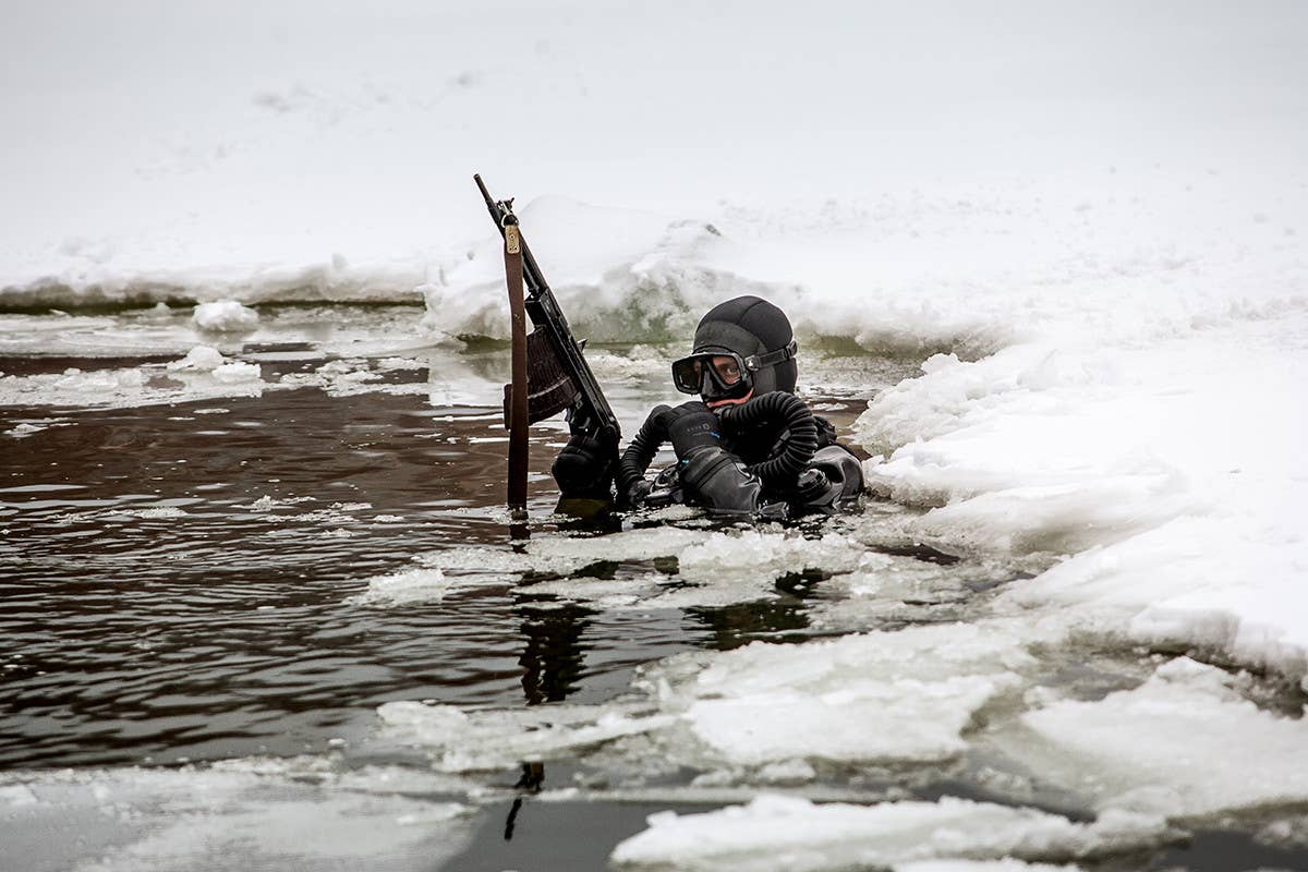 A Russian combat diver with an APS underwater rifle. <em>Russian Ministry of Defense</em>