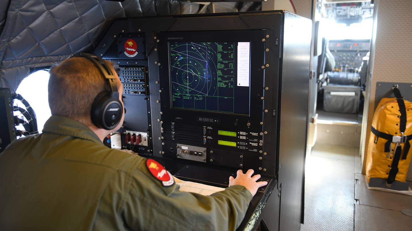SSgt. Andrew Butler monitors the radar screen inside an E-9 over the Eastern Gulf of Mexico. <em>USAF/A1C Tiffany Price</em>