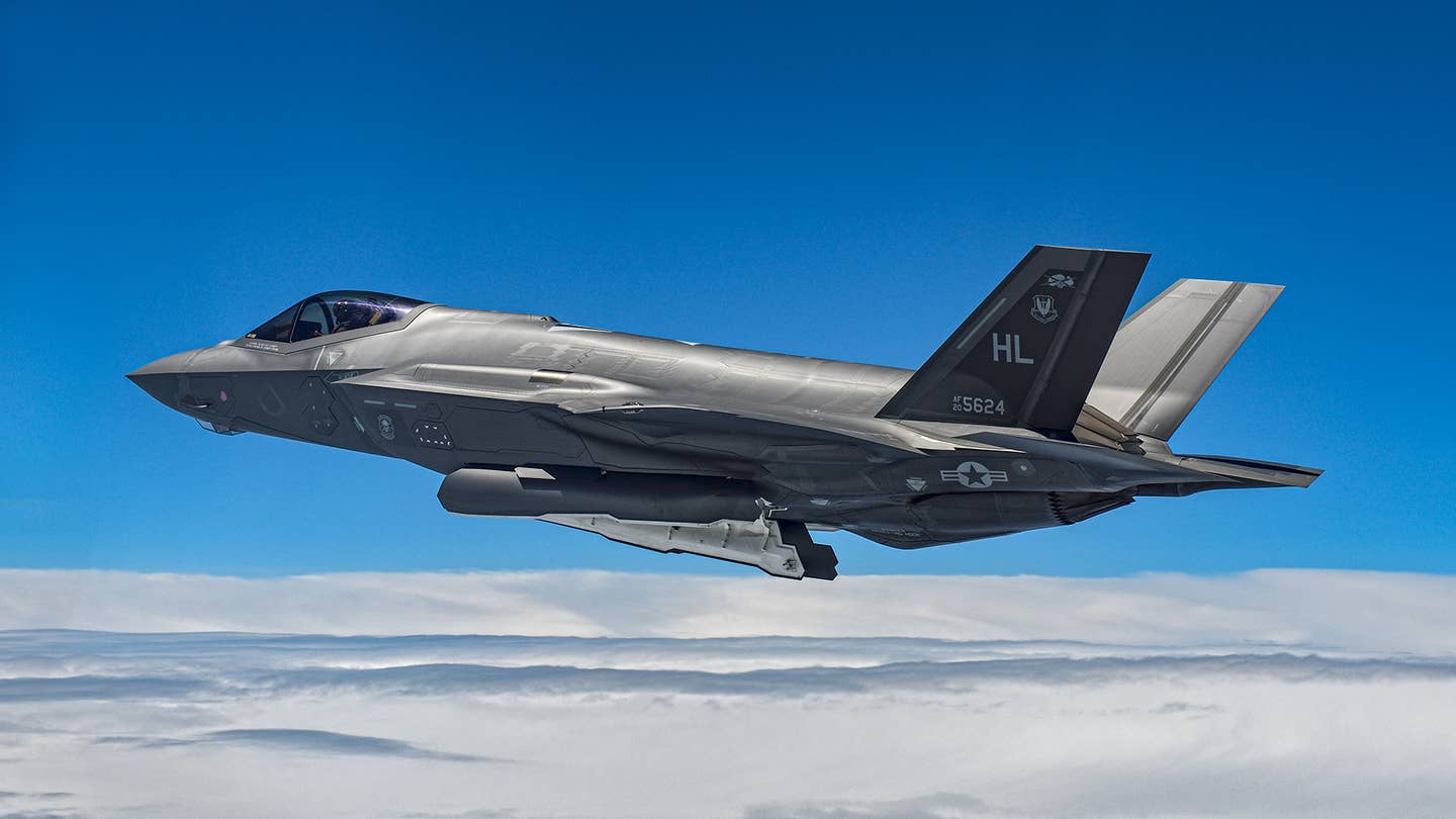 A 388th FW F-35A opens its weapon bay doors so that the range team can check the telemetry feed from its live internal AIM-120 AMRAAM. <em>Jamie Hunter</em>