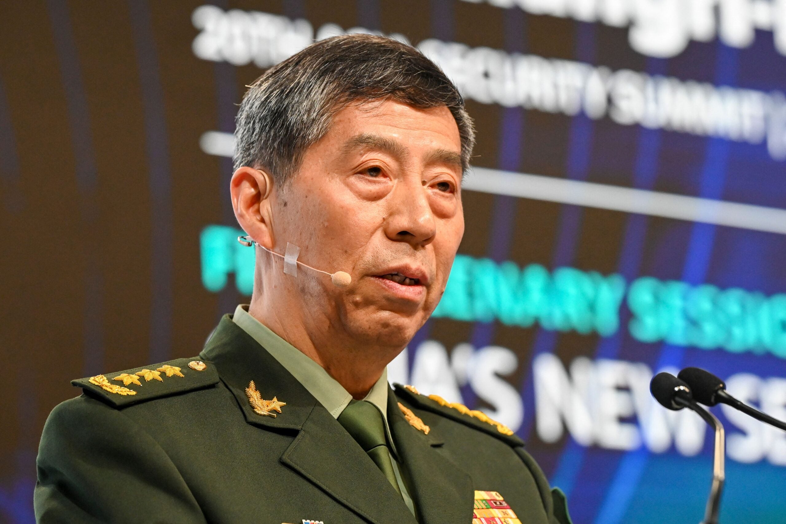 China's Minister of National Defence Li Shangfu delivers a speech during the 20th Shangri-La Dialogue summit in Singapore on June 4, 2023. (Photo by Roslan RAHMAN / AFP) (Photo by ROSLAN RAHMAN/AFP via Getty Images)