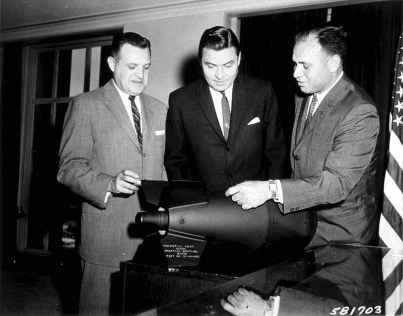 U.S. officials examine a M-388 Davy Crockett nuclear weapon. The W54 nuclear warhead was used in the man-portable&nbsp;M-388 Davy Crockett&nbsp;projectile. The unusually small size of the warhead is apparent. <em>DoD</em>