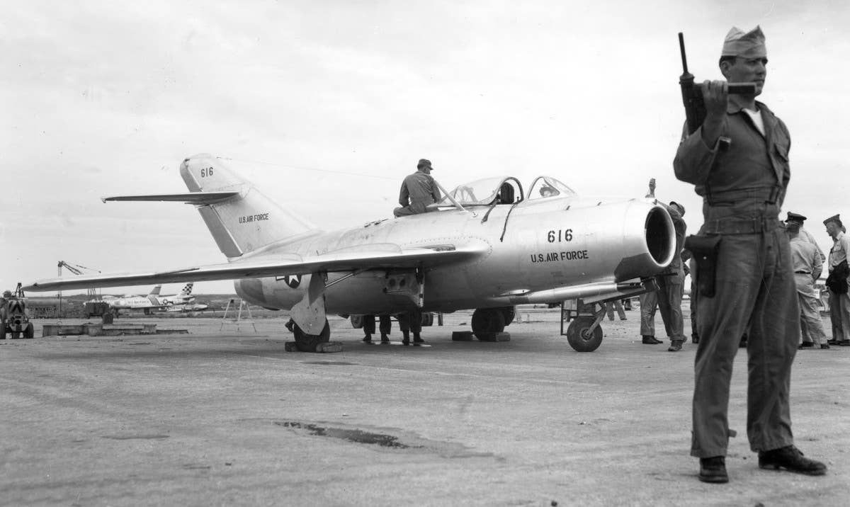 No Kum Sok's MiG-15 repainted in US Air Force markings and under armed guard on the Japanese island of Okinawa. <em>USAF</em>