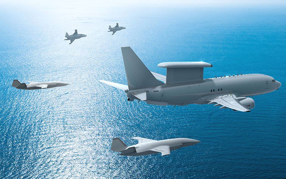 A rendering of MQ-28 Ghost Bat drones flying together with a Boeing E-7 Wedgetail airborne early warning and control aircraft. <em>Boeing</em>