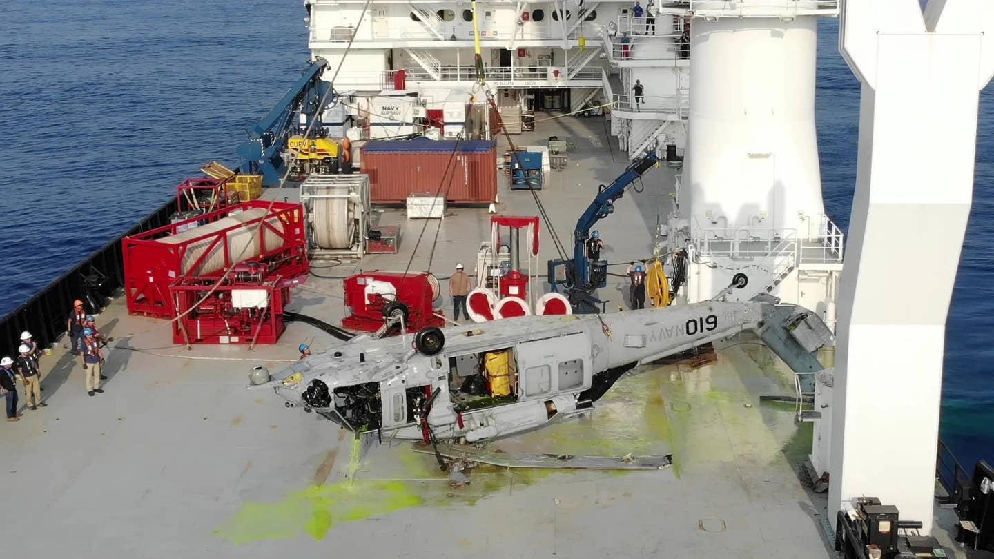 The wreck of an MH-60S Sea Hawk helicopter the Navy pulled up from a depth of around 19,075 feet in 2021.