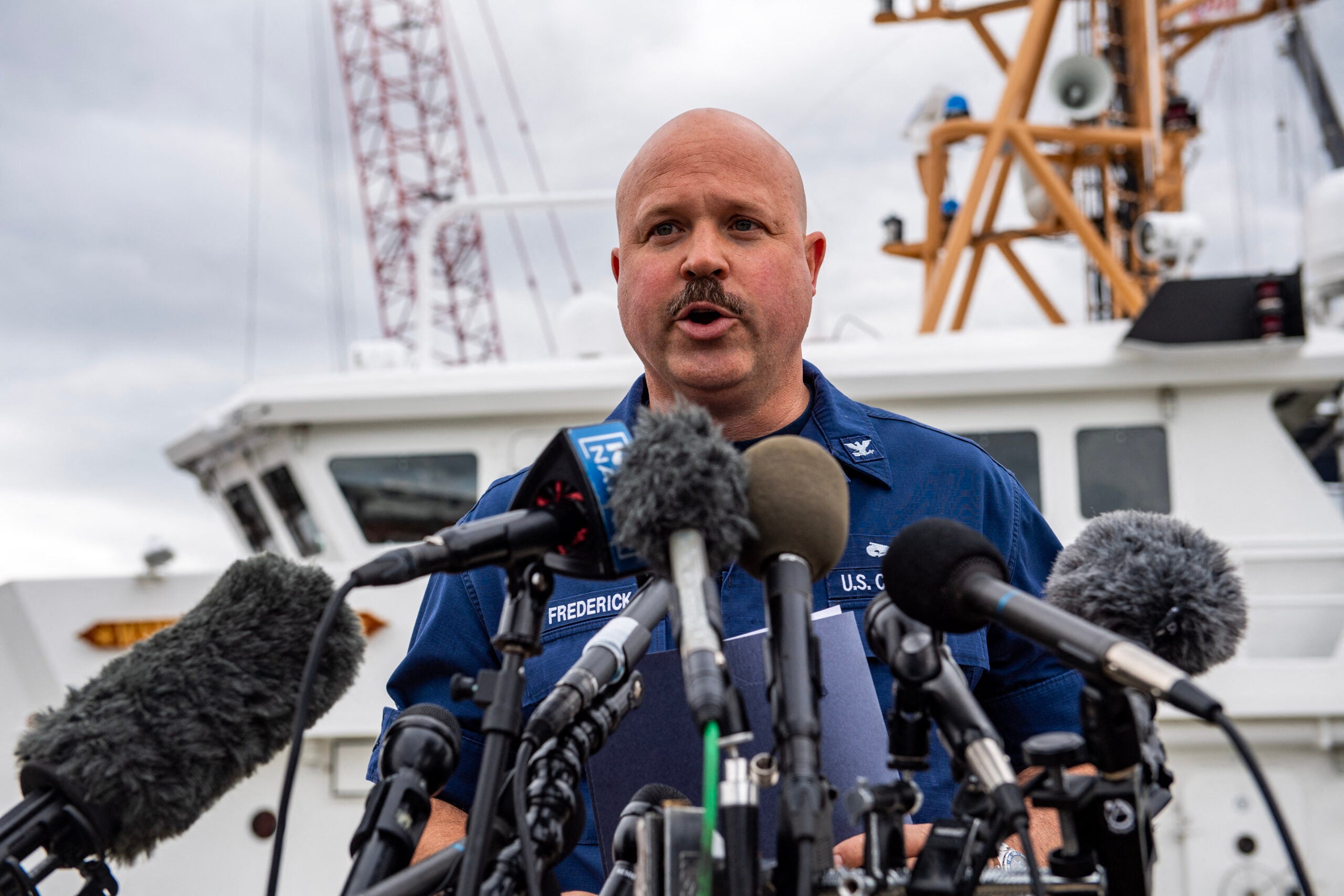 US Coast Guard Captain Jamie Frederick speaks during a press conference about the search efforts for the submersible that went missing near the wreck of the Titanic, at Coast Guard Base in Boston, Massachusetts, on June 20, 2023. The Titan submersible with five people on board has "about 40 hours of breathable air" left, Frederick said Tuesday. (Photo by Joseph Prezioso / AFP) (Photo by JOSEPH PREZIOSO/AFP via Getty Images)