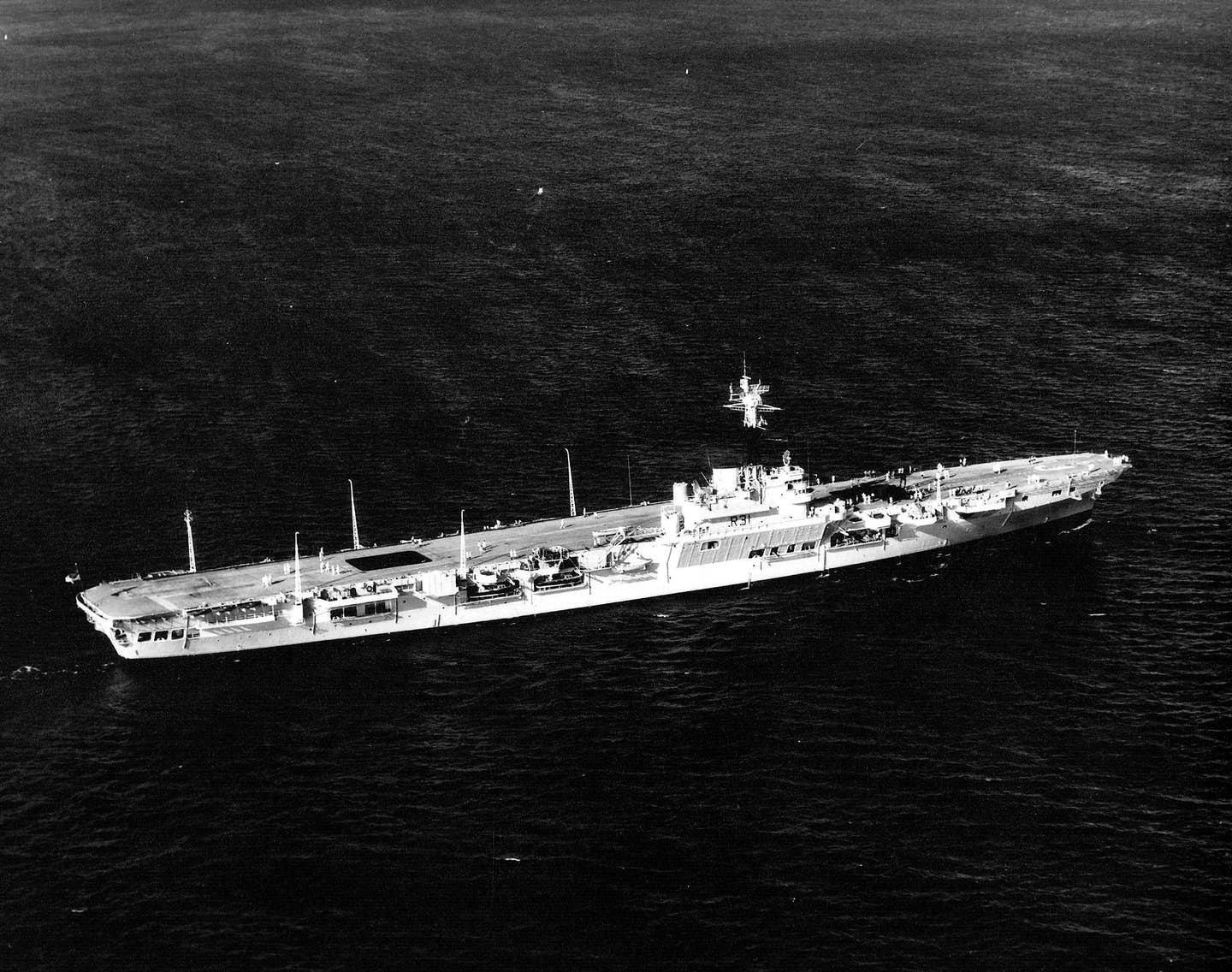 The Royal Navy aircraft carrier HMS&nbsp;<em>Warrior</em>&nbsp;(R31), seen in around 1957, after having been converted back to having a normal flight deck. <em>U.S. Navy</em>