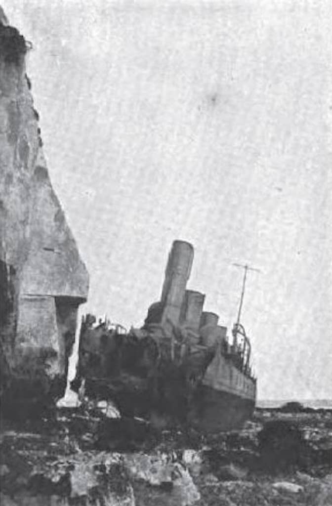 HMS <em>Nubian</em>'s minus bow at the base of the cliffs of Dover. <em>via Wikimedia Commons/unknown author</em>