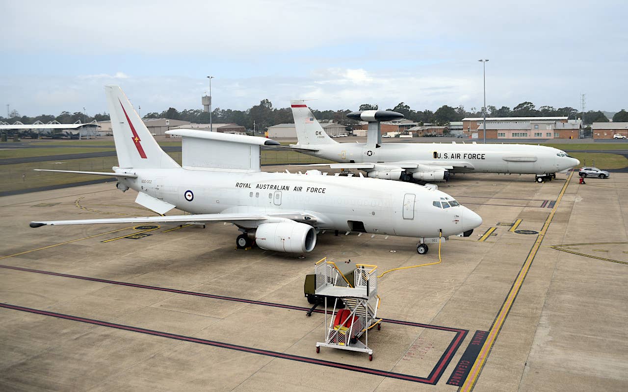 A US Air Force E-3G Sentry, at rear, alongside a Royal Australian Air Force E-7A Wedgetail, in the foreground. <em>USAF</em>