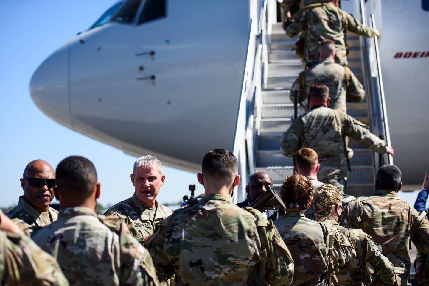 Maj. Gen. Chalres Costanza, greets members of the 1st Armored Brigade Combat Team, 3rd Battalion, 69th Armored Regiment deploy to Germany on March 2, 2022 in Savannah, Georgia. (Photo by Melissa Sue Gerrits/Getty Images)