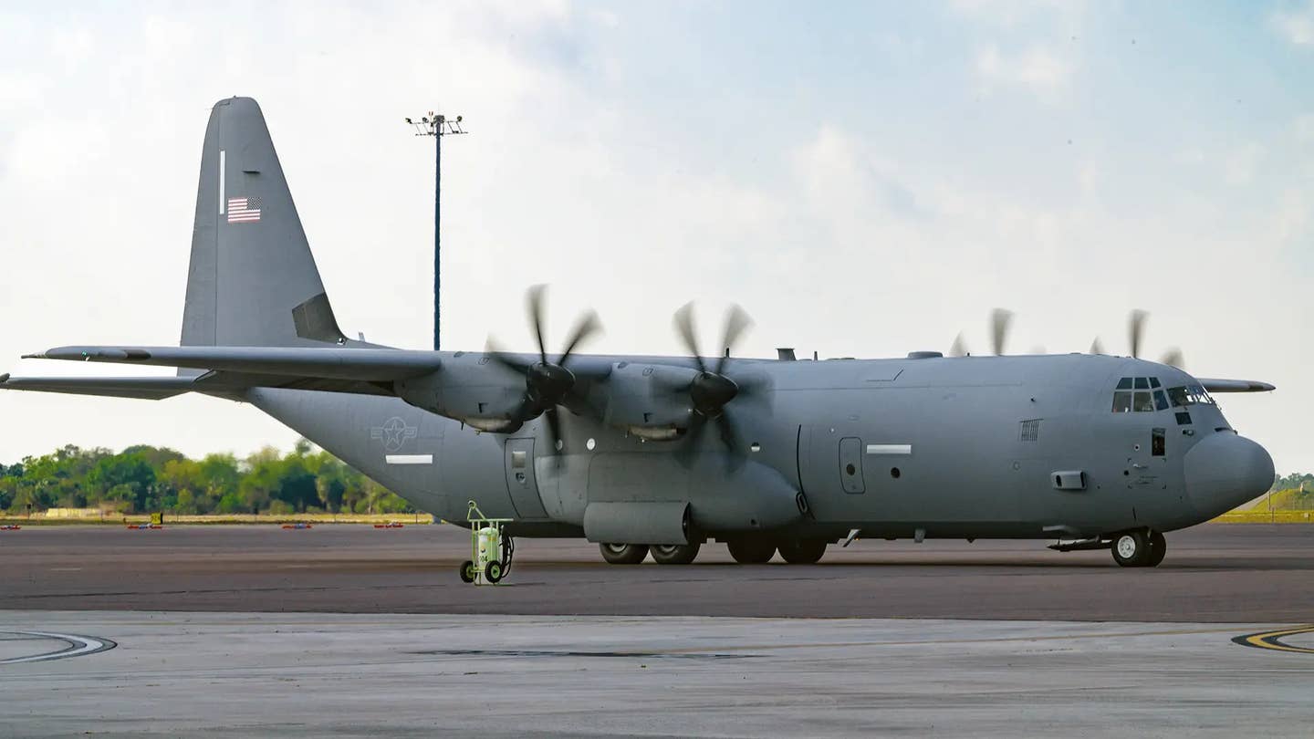 An Air Force C-130J Hercules transport aircraft with more limited markings under the new operations security policy.