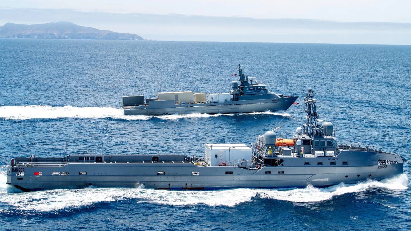Two large uncrewed surface vessels that the Navy has been using for various test and evaluation purposes. <em>USN</em>