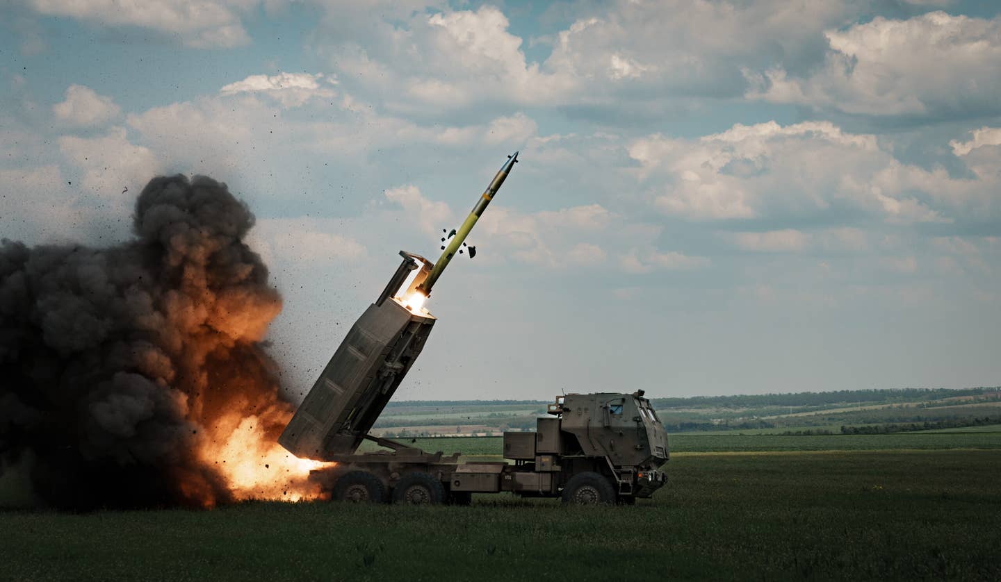 An M142 HIMARS launches a rocket against the Bakhmut direction on May 18, 2023, in the Donetsk region, eastern Ukraine. <em>Photo by Serhii Mykhalchuk/Global Images Ukraine via Getty Images</em>