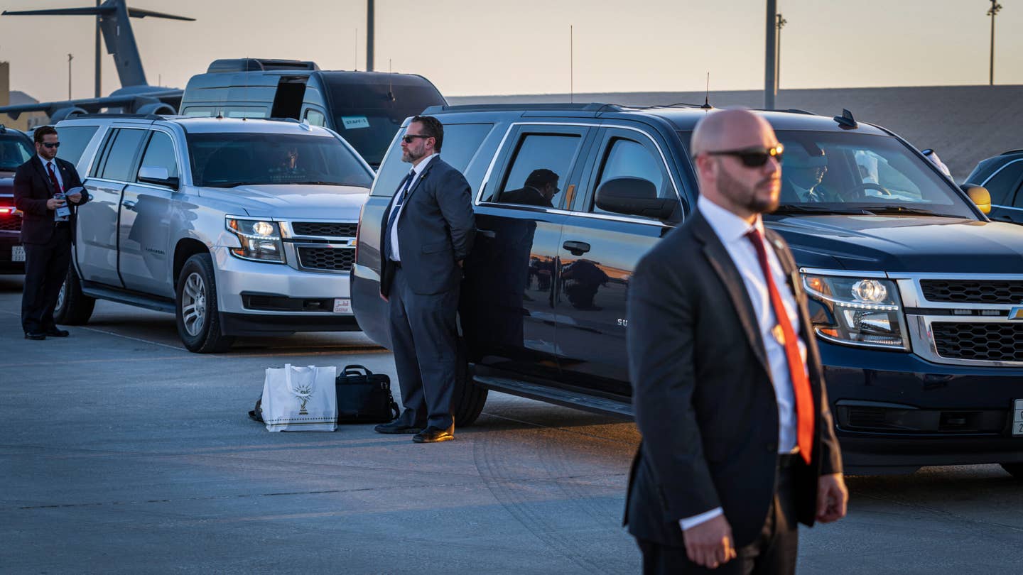 Up-armored Suburbans have been a staple of DDS' fleet for many years. Here DSS special agents and the Secretary of State’s Protective Detail Division accompany Secretary Blinken’s motorcade as he attends the 2022 FIFA World Cup in Doha, Qatar, November 22, 2022. <em>Photo by Ronny Przysucha</em>