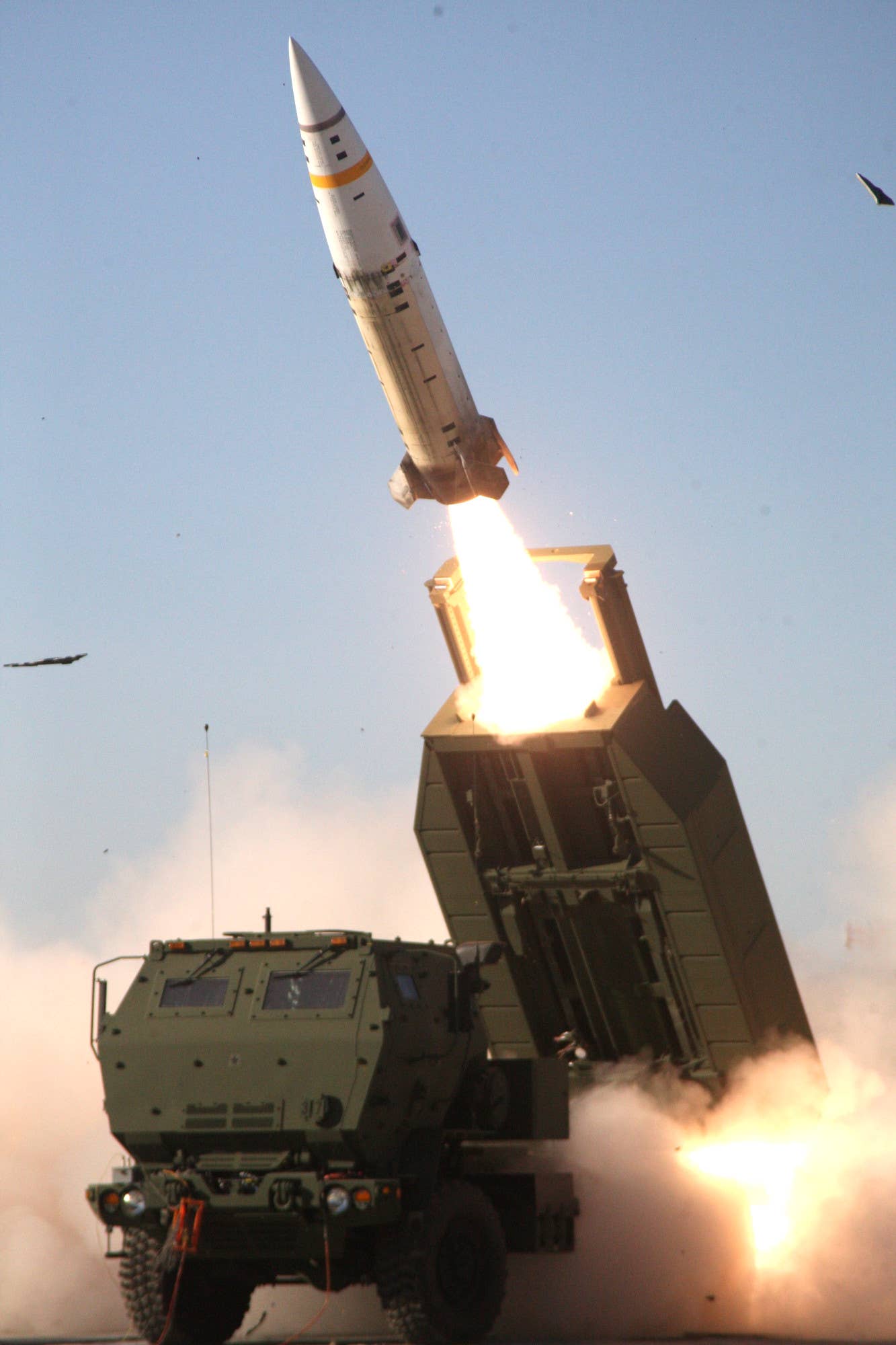 A US Army HIMARS launcher fires an ATACMS missile. <em>US Army</em>