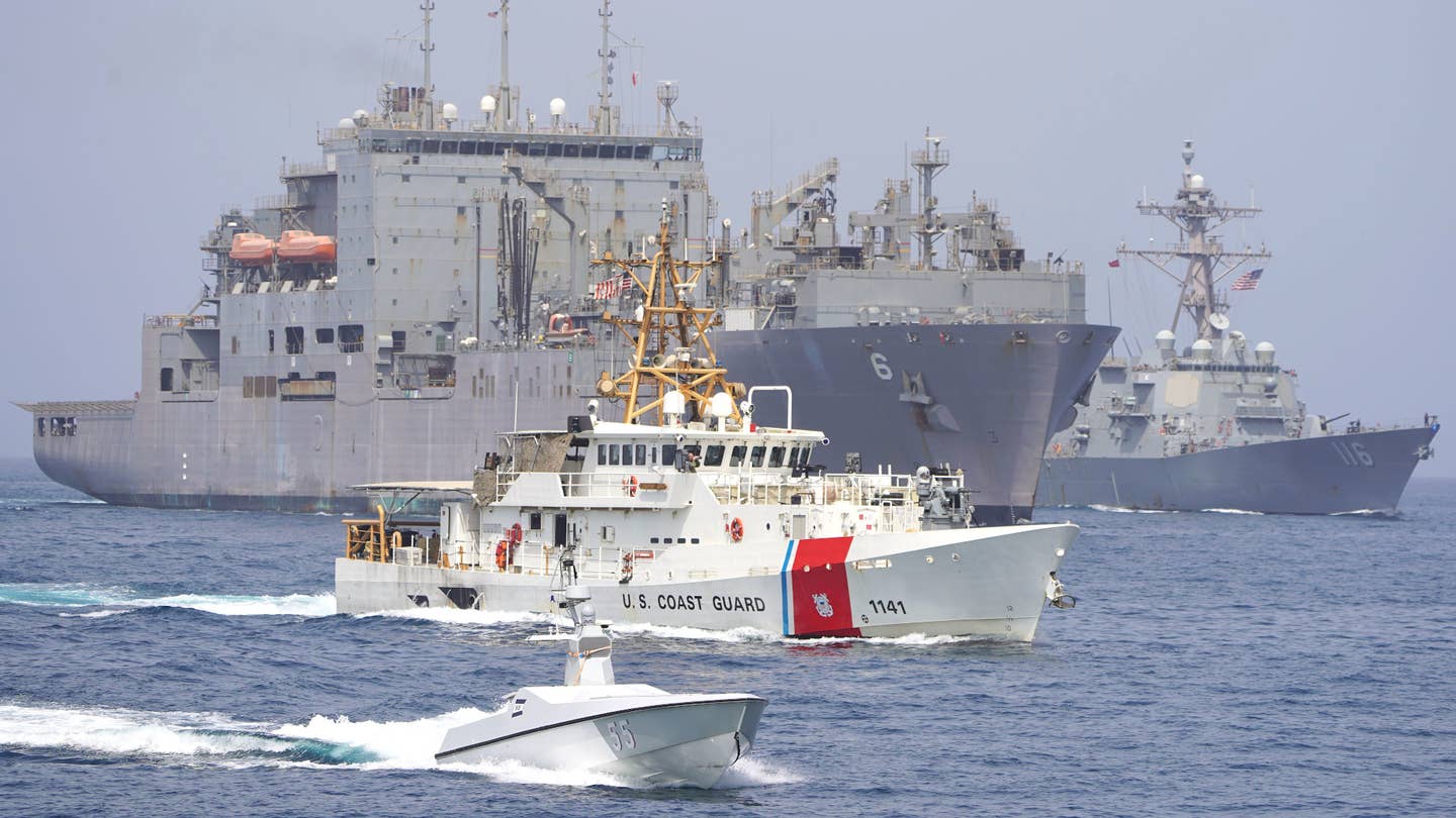 An uncrewed surface vessel known as the Arabian Fox was out front as part of a group of US Navy and Coast vessels during a recent transit of the Strait of Hormuz.