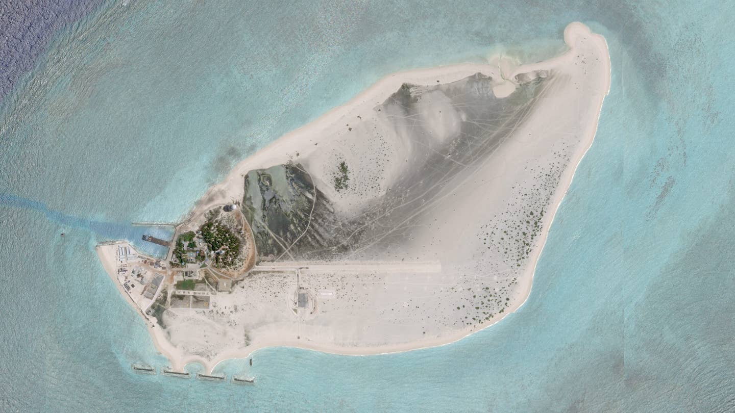 A full view of Triton Island, dated August 10, 2023, with the airstrip clearly visible. <em>PHOTO © 2023 PLANET LABS INC. ALL RIGHTS RESERVED. REPRINTED BY PERMISSION</em>