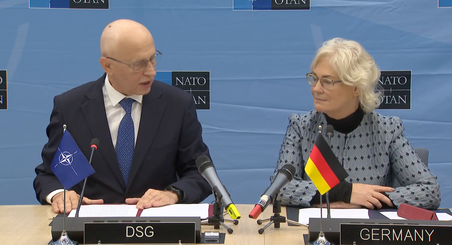 NATO Deputy Secretary General Mircea Geoană and the-then German Minister of Defense Christine Lambrecht discuss the European Sky Shield Initiative in Brussels in October 2022. <em>Screenshot via DVIDSHub</em>