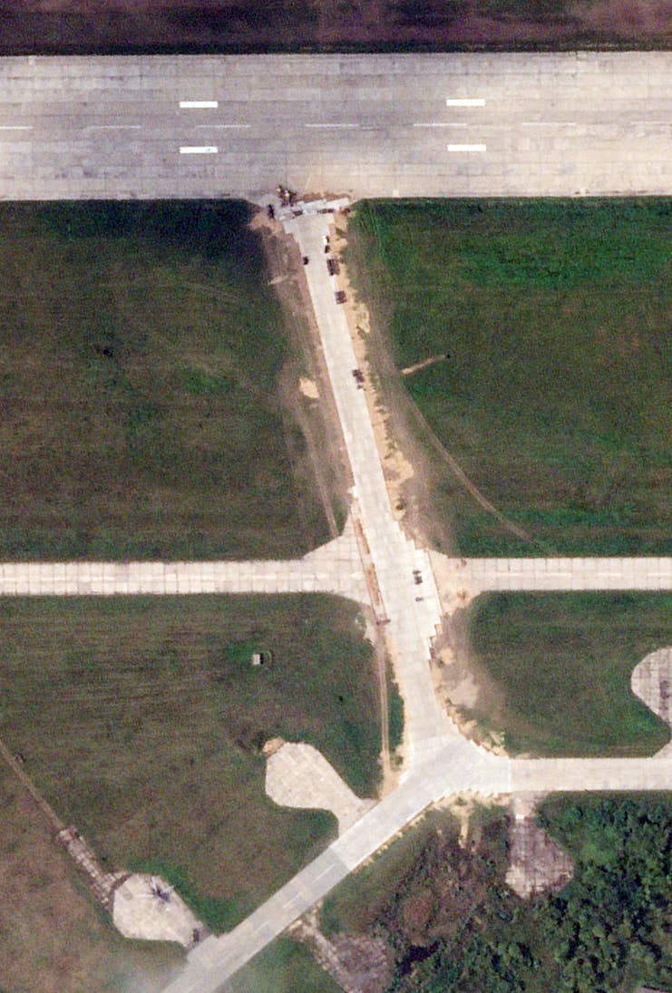 A Russian helicopter was visible at the Soltsy-2 airfield in a Planet Labs satellite image taken on Aug. 21. <em>PHOTO © 2023 PLANET LABS INC. ALL RIGHTS RESERVED. REPRINTED BY PERMISSION</em>