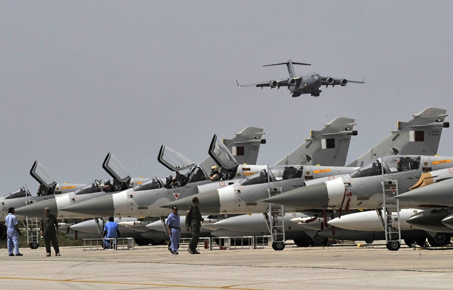 Qatari Mirage 2000-5 fighters at Souda Air Base on the southern Greek island of Crete during the coalition air campaign over Libya, in March 2011. <em>LOUISA GOULIAMAKI/AFP via Getty Images</em>