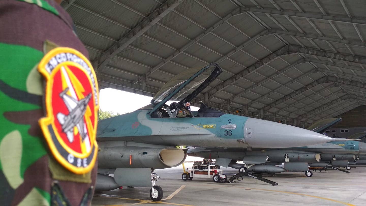 An Indonesian Air Force F-16 prepares to take off from an airbase in Pekanbaru, Riau, in January 2020. Indonesia had deployed fighters and warships to patrol islands near the disputed South China Sea, during escalating tensions with Beijing over “trespassing” Chinese vessels. <em>Photo by STR/AFP via Getty Images</em>