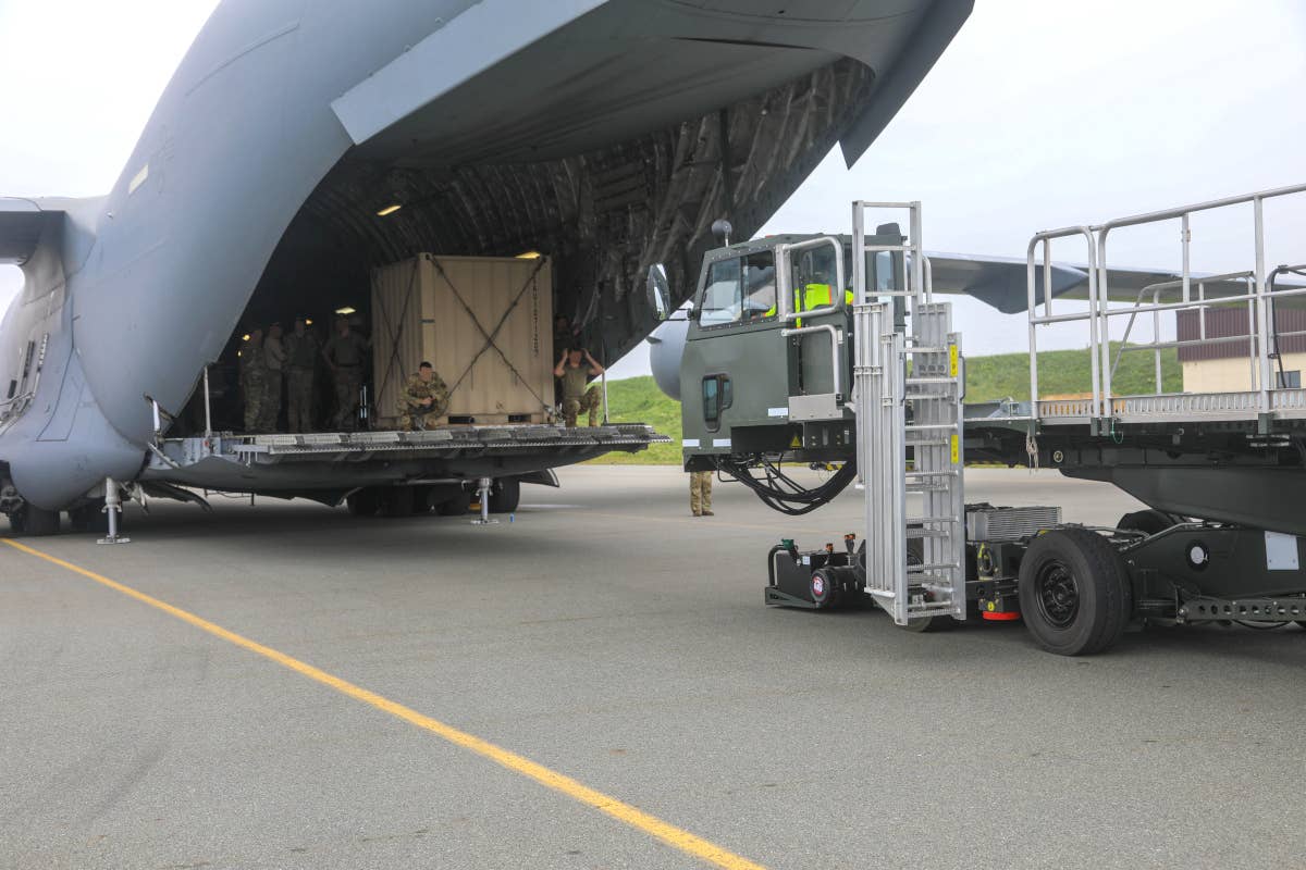 Cargo belonging to the Army's 160th SOAR is offloaded from a US Air Force C-17A Globemaster III aircraft at Eareckson Air Station on Shemya Island in support of the Polar Dagger exercise. <em>US Army</em>