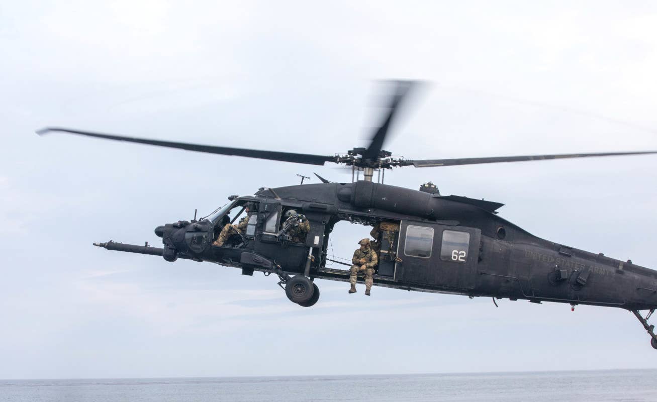 One of the 160th SOAR's MH-60Ms that took part in the recent Polar Dagger exercise. The CIRCM on top of the fuselage is plainly visible. The companion turret underneath the fuselage is much harder to spot, but can be seen just behind and below the lower right-hand corner of the open main cabin door. <em>US Army</em>