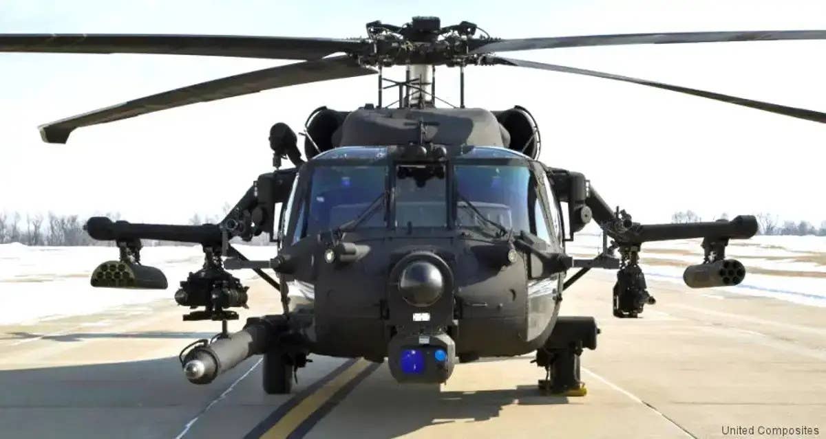 One of the 160th SOAR's MH-60Ms configured as a Direct Action Penetrator (DAP) and armed with a 30mm automatic cannon, two different types of 70mm rocket pods, AGM-114 Hellfire missiles. <em>United Composites</em>